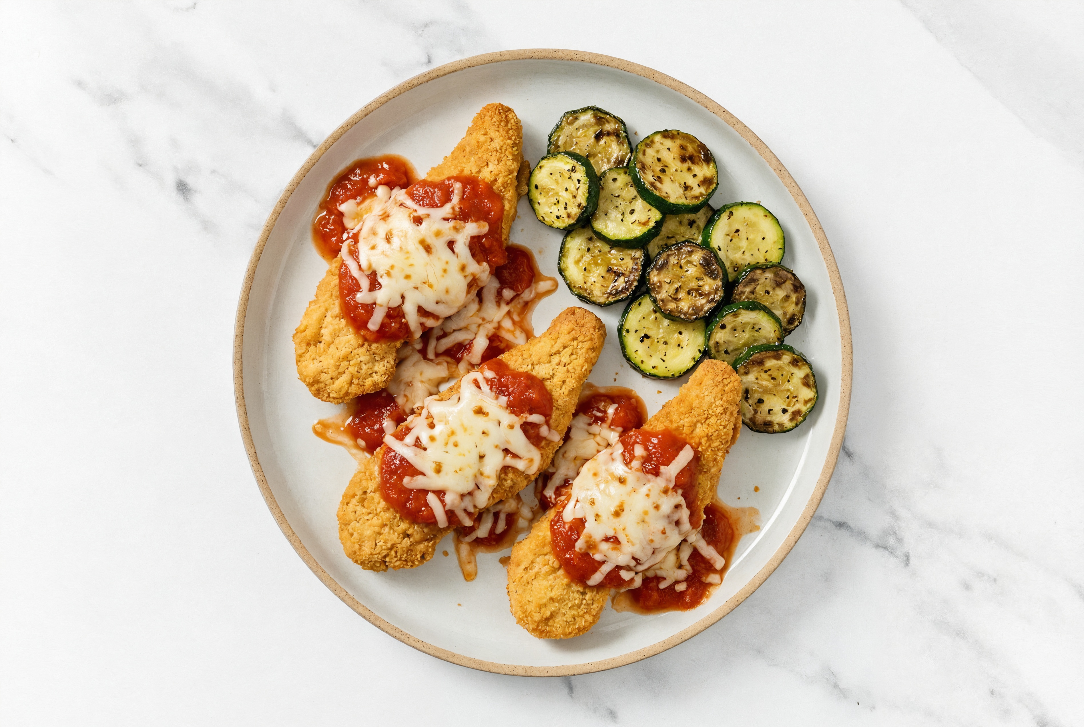 Hearty Plant-Based Chicken Parm Tenders with Zucchini