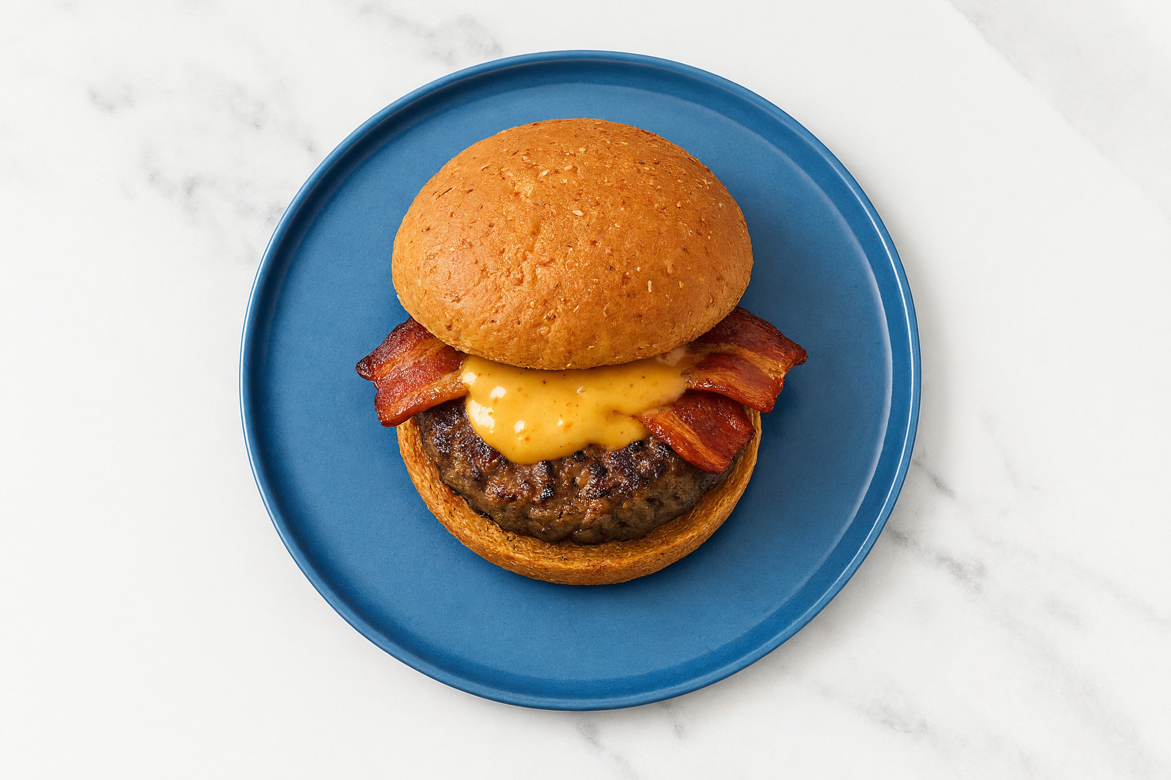Beef Burger on Sprouted Grain with Smoky BBQ & Turkey Bacon