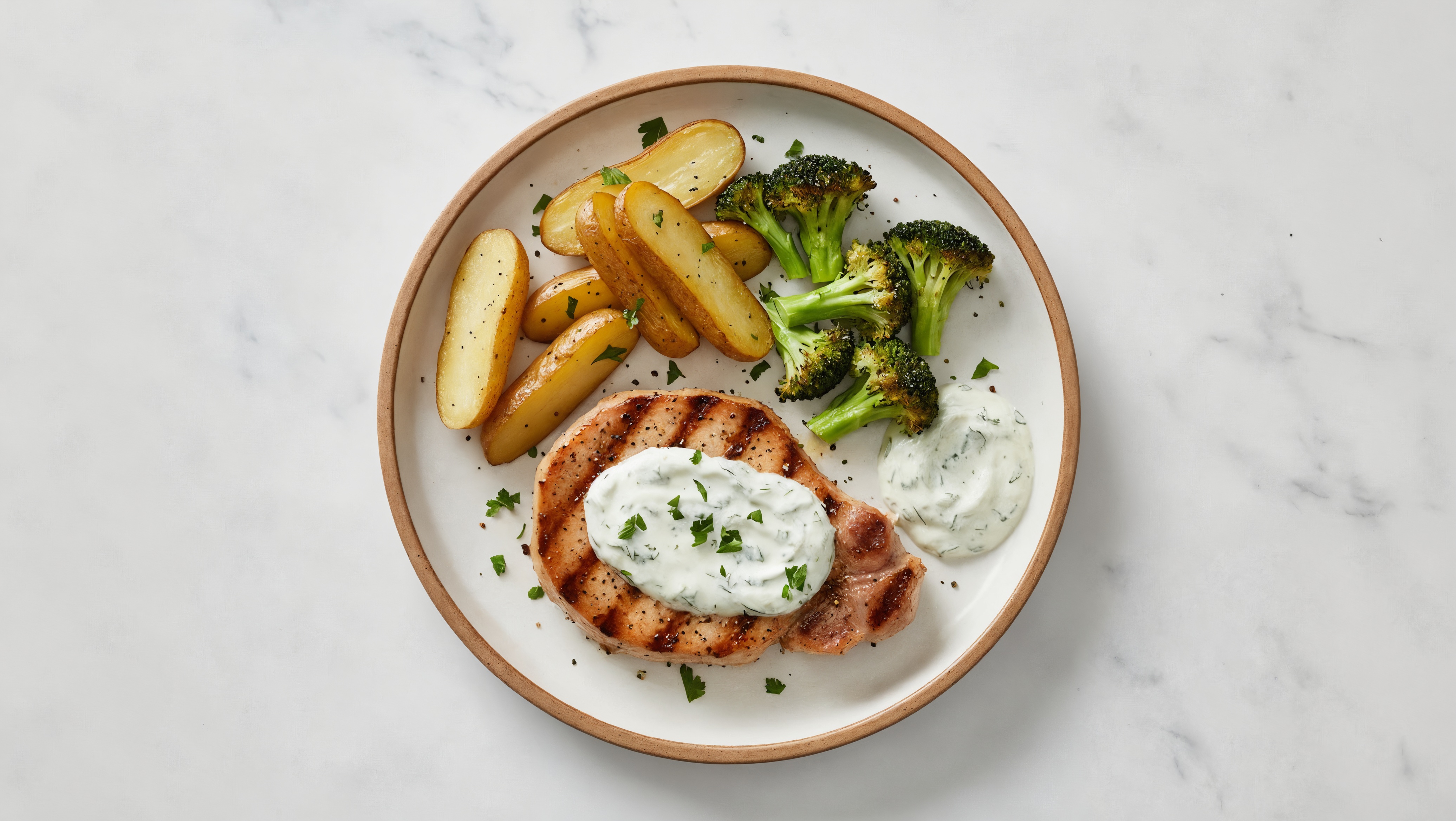 Herby Sheet-Pan Pork Chop + Veggies with Tzatziki with Broccoli Florets