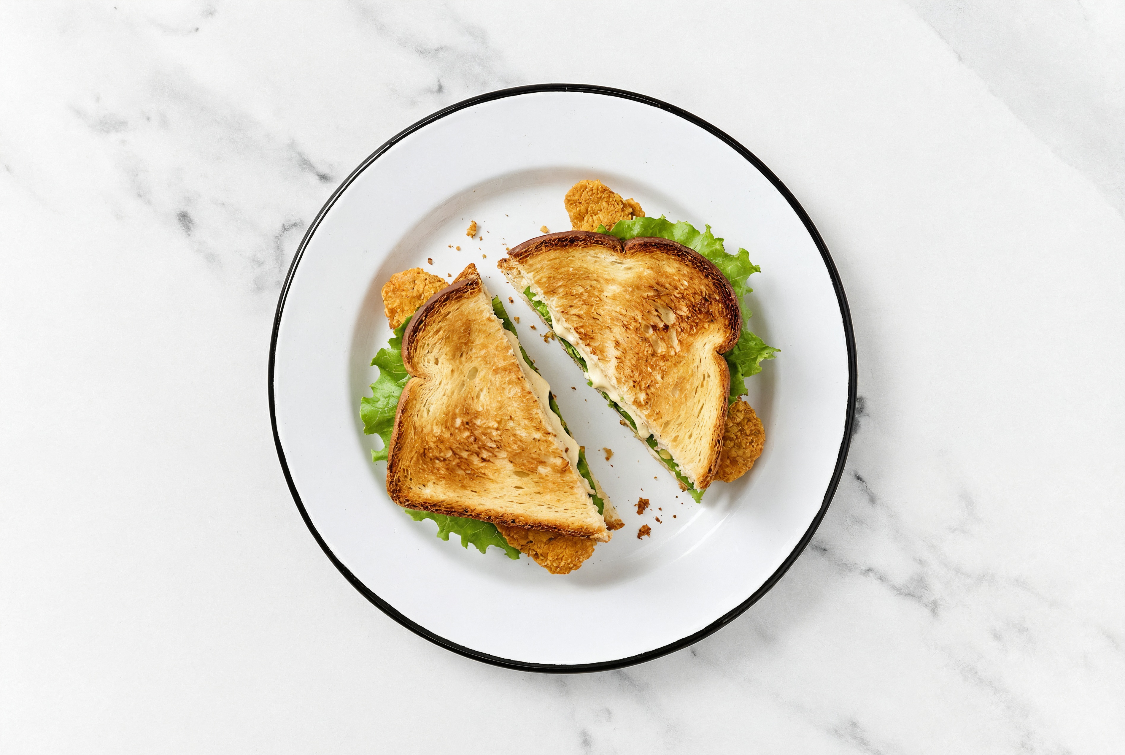 Creamy Horseradish "Chicken" Tenders Sandwich with Green Leaf Lettuce on Honey White Bread