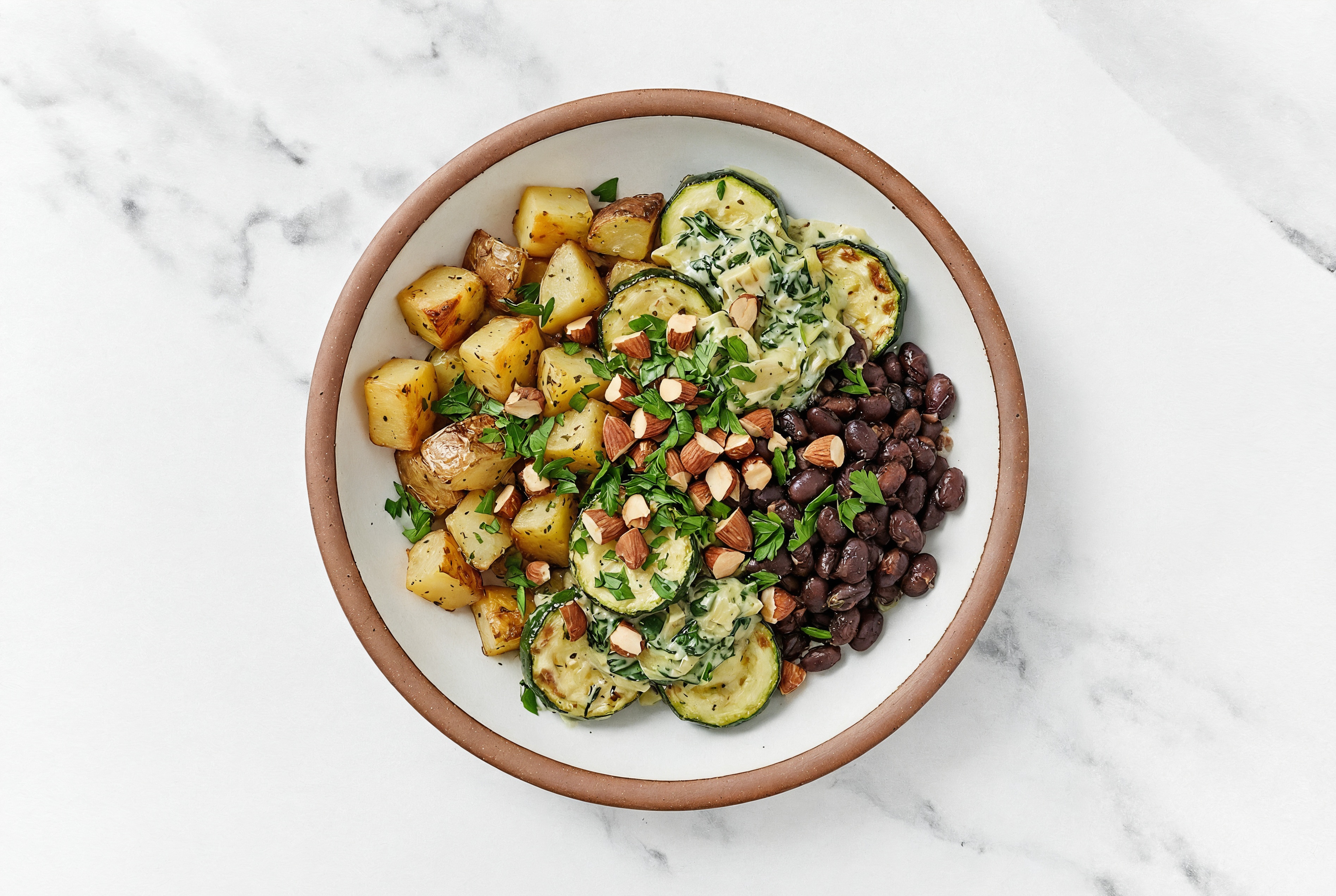 Black Bean Beans + Zucchini with Spinach Artichoke Sauce + Chopped Almonds over Potatoes