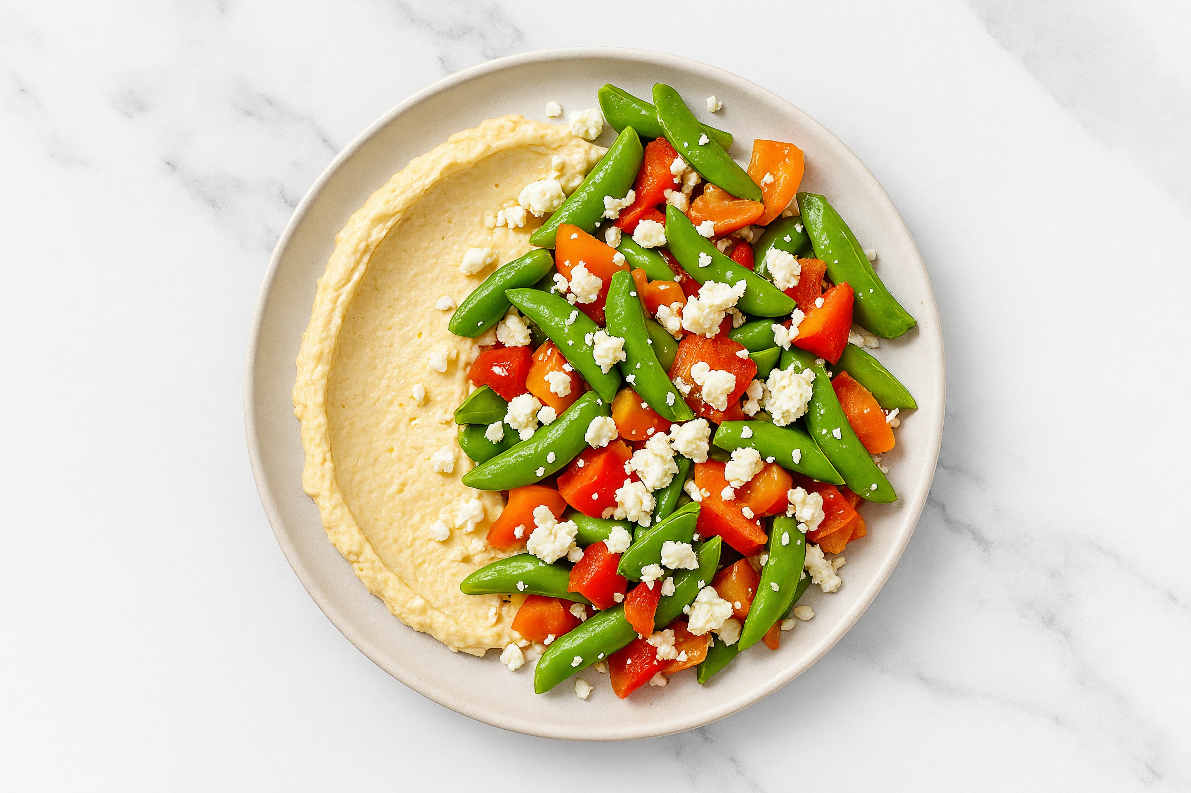 Feta Sweet Pepper Snap Pea Bowl over Lemon Garlic Hummus
