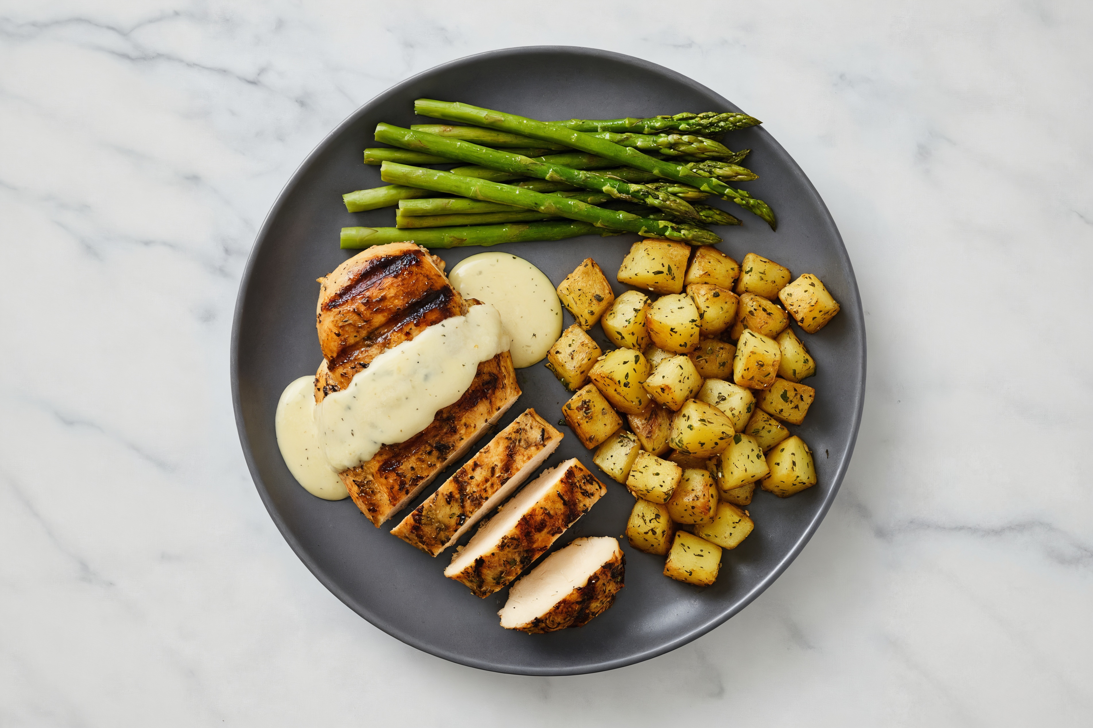 Caesar Grilled Mediterranean Chicken Breast with Herbed Potatoes + Asparagus