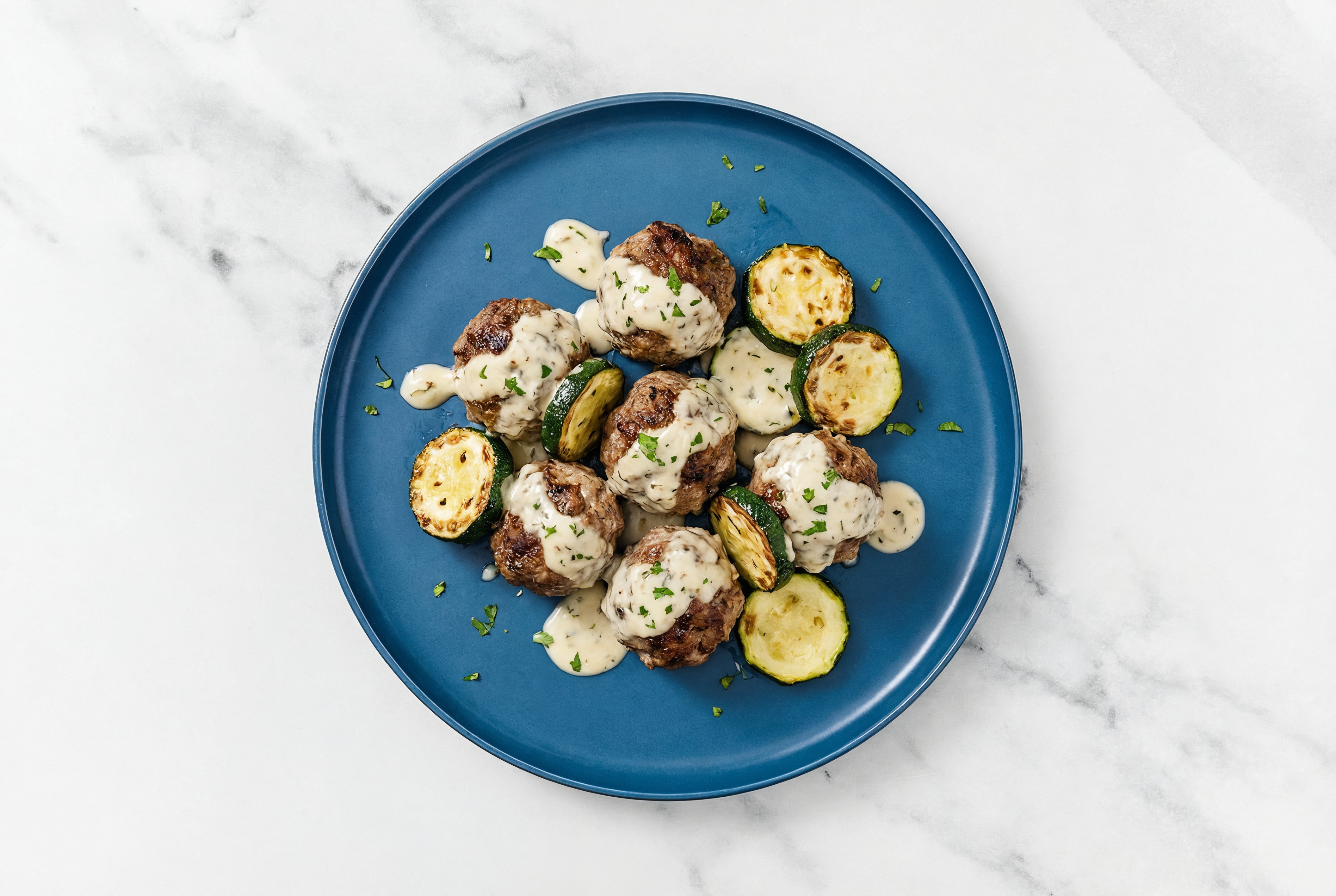 Creamy Garlic Baked Bison Meatballs & Zucchini