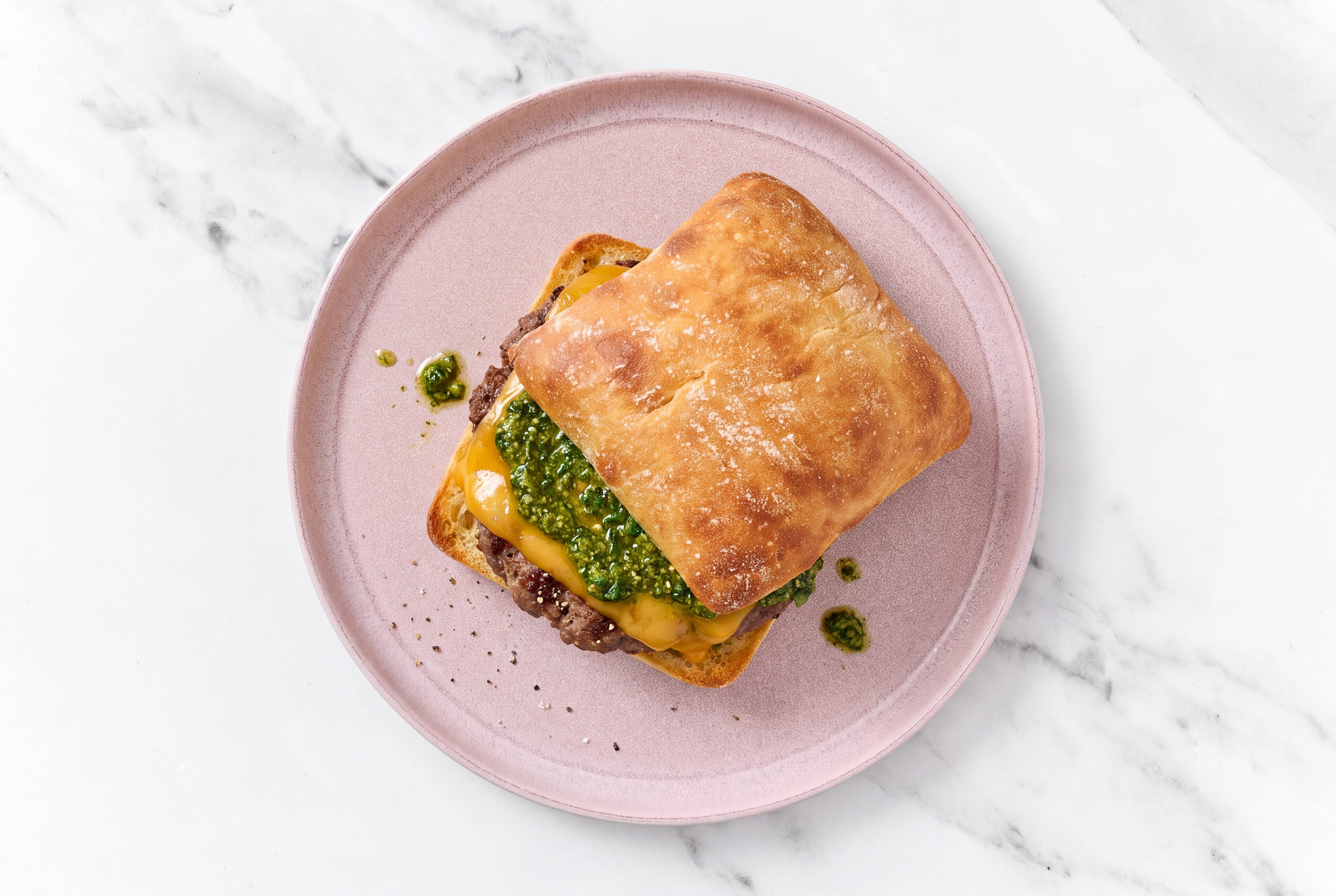 Bison Burger on Ciabatta with Pesto & Cheddar