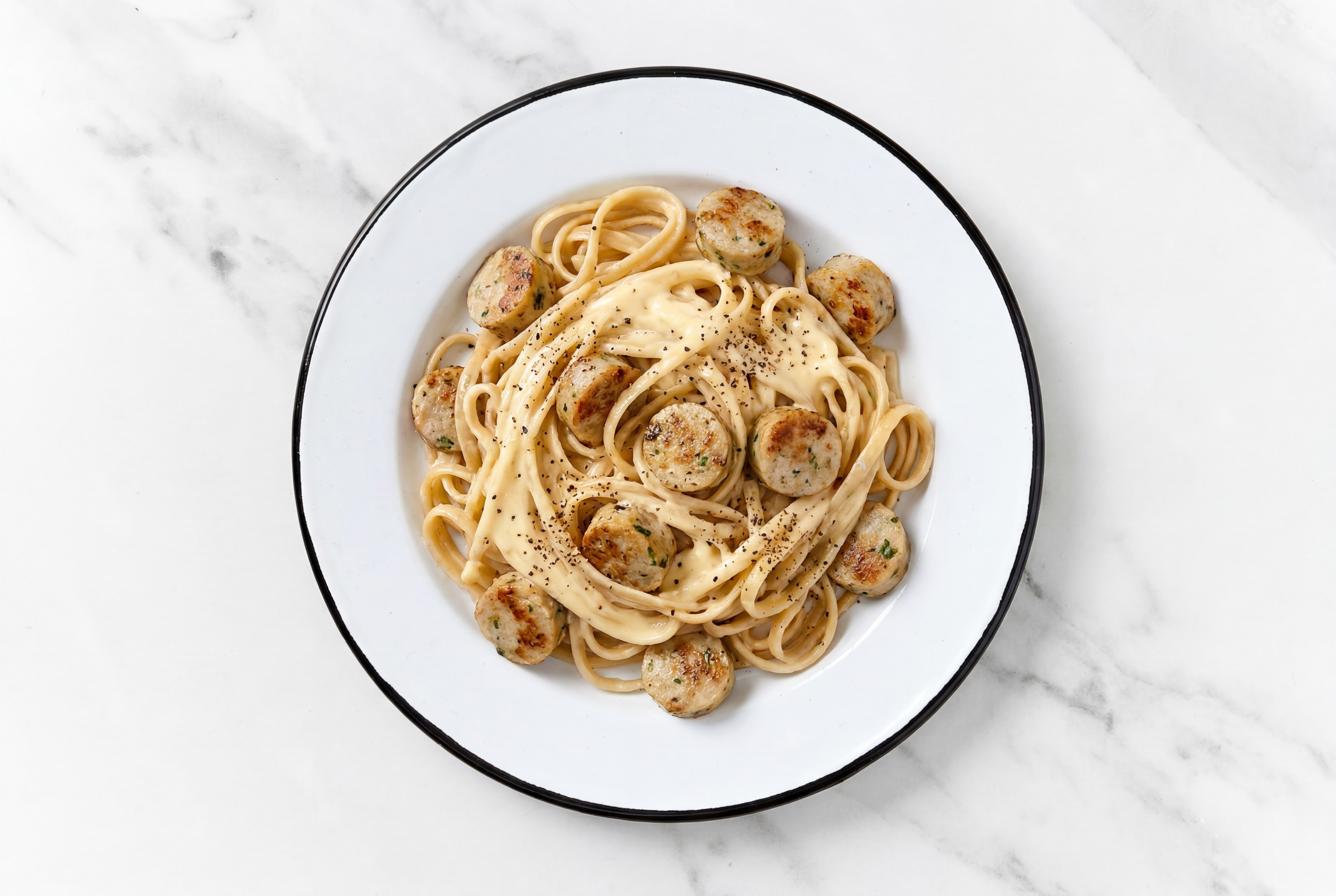 Creamy Cheddar Egg Pasta with Garlicky Chicken Sausage with Cauliflower Linguine