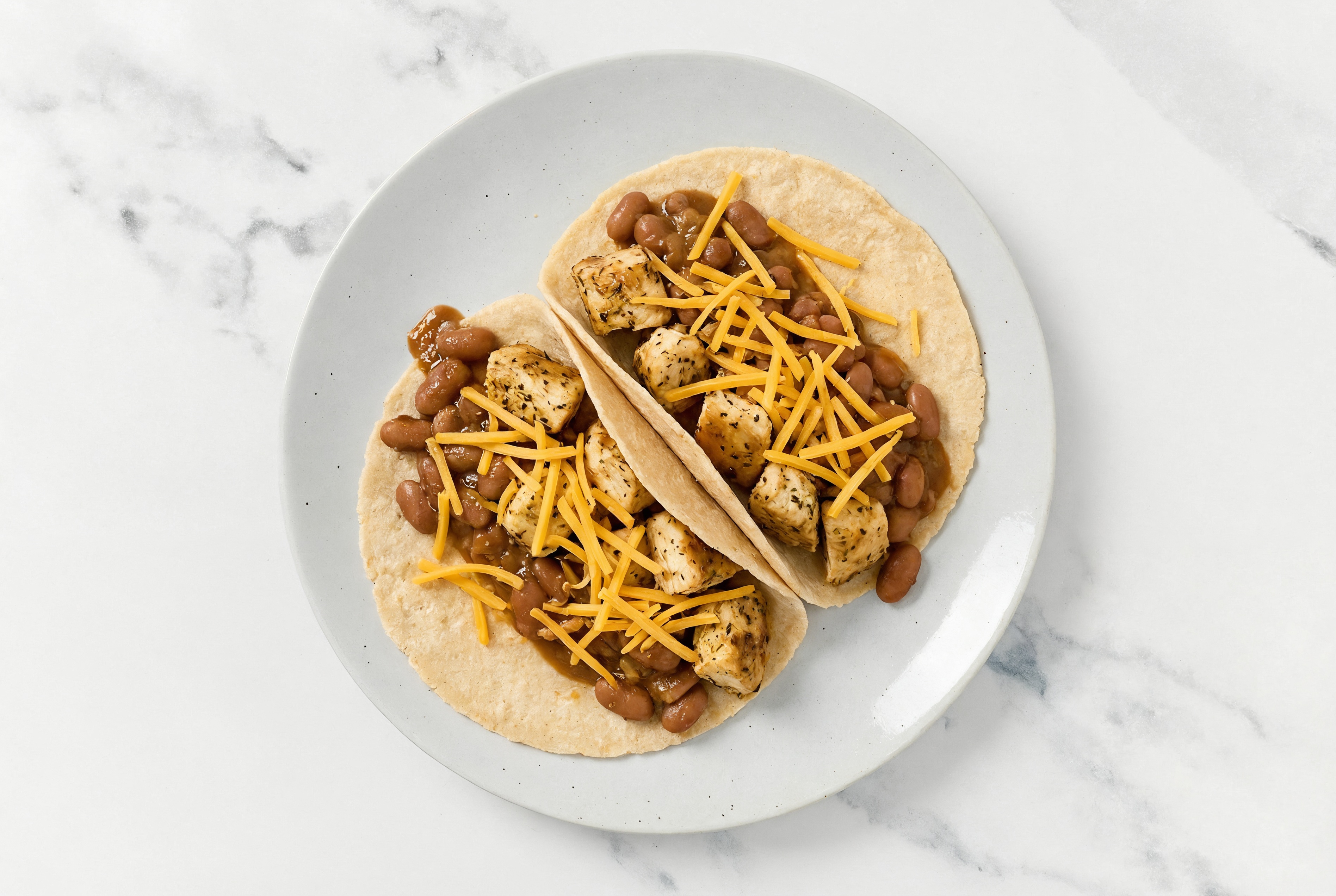 Garlic Chicken Tacos with Cheddar Cheese & Pinto Beans
