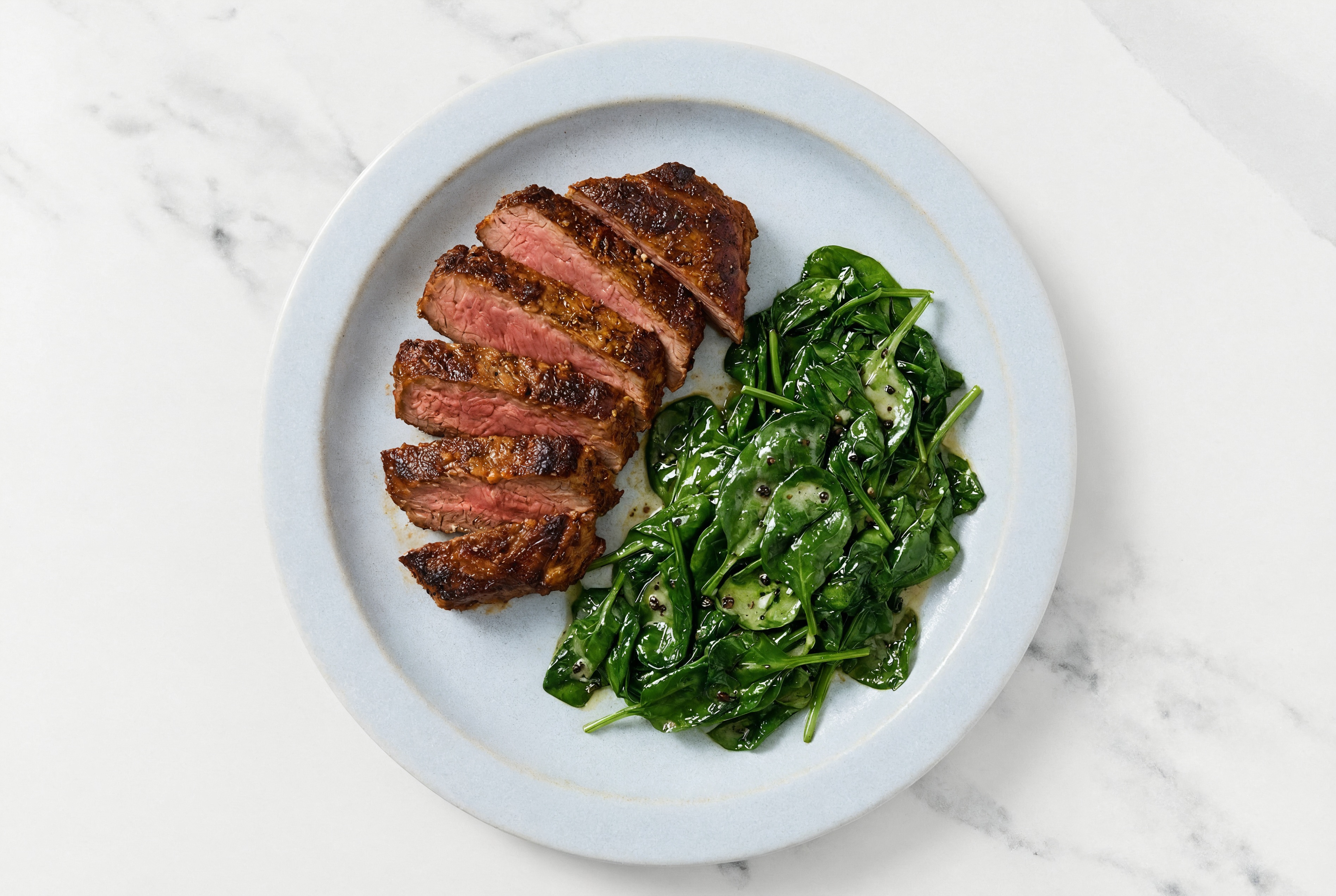 Adobo Marinated Flank Steak n' Slow Churned Lemon & Peppercorn Pasture Butter Pepper Baby Spinach