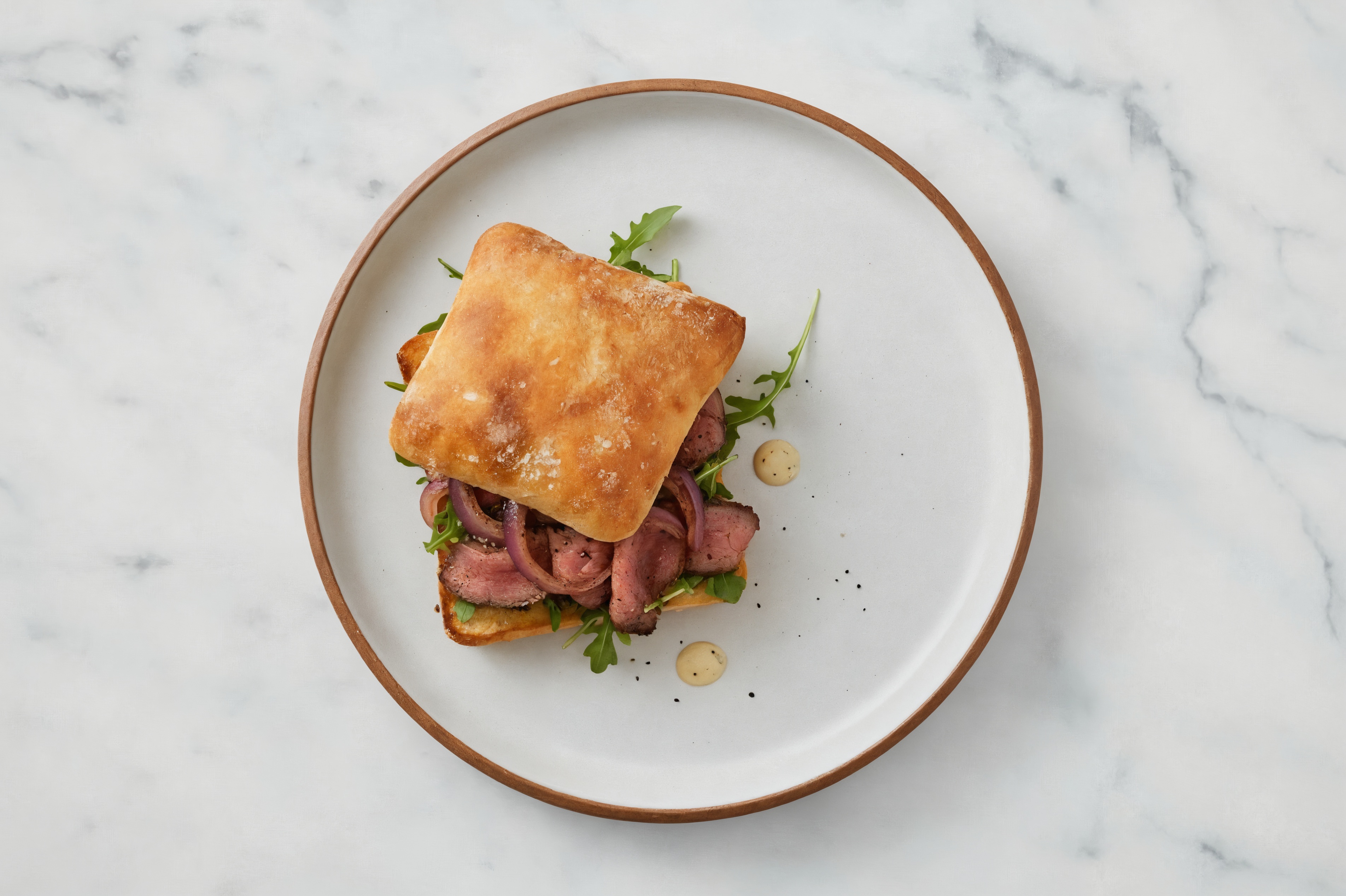 Caramelized Onion Asiago Steak Sandwich + Arugula Salad