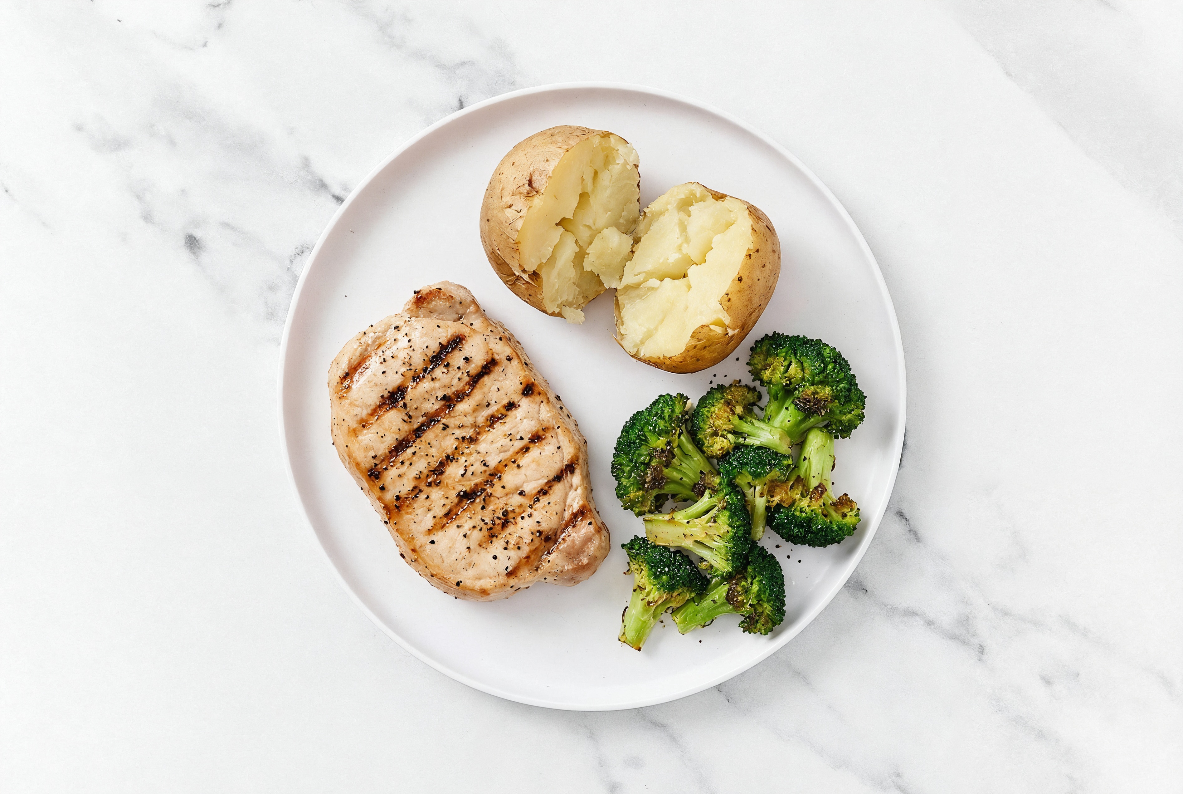 Seared Pork Chop with Baked Potato + Organic Broccoli