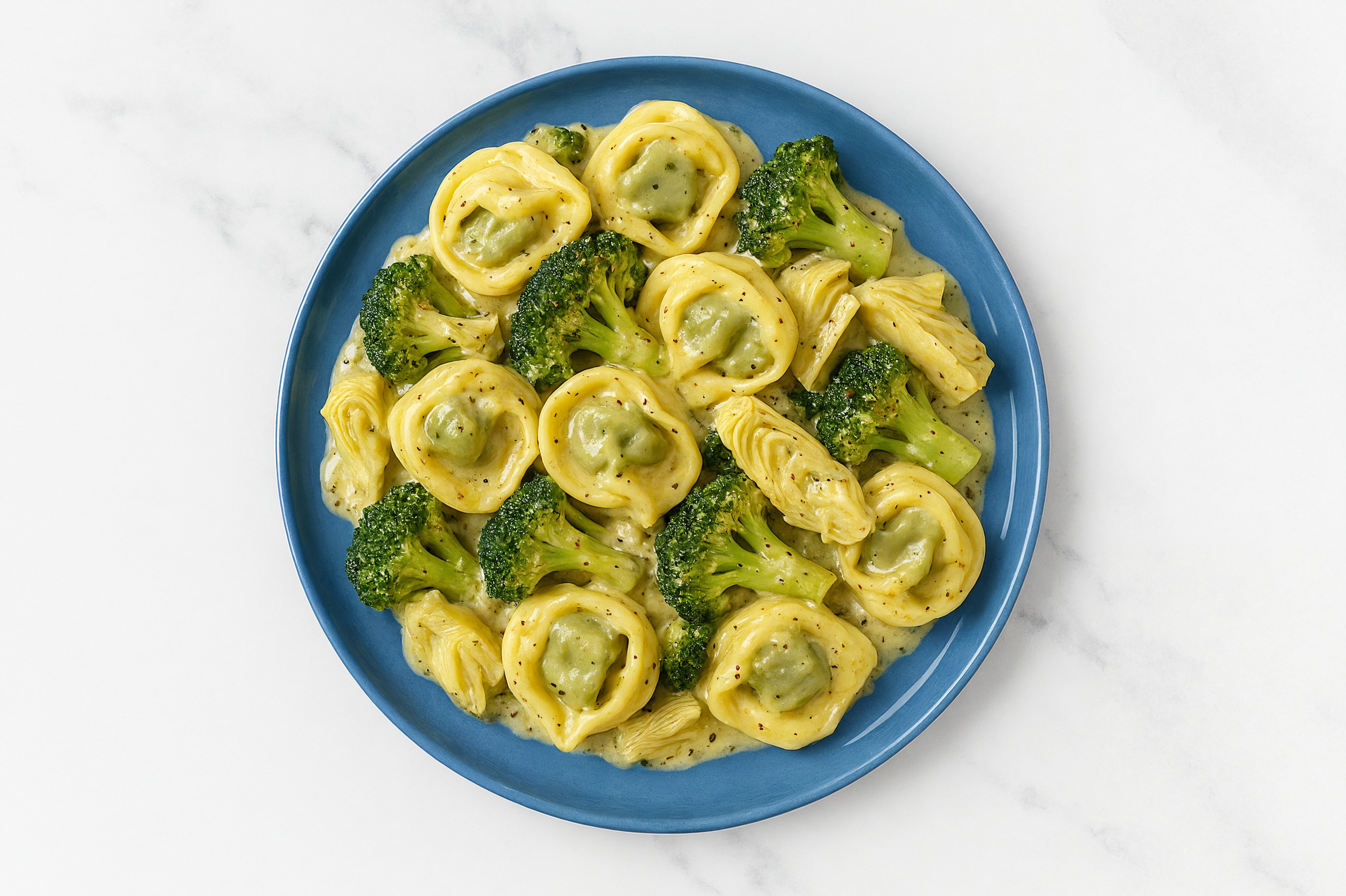 Herby Veggie Antipasti Tortellini Herb Cream with Broccoli Florets