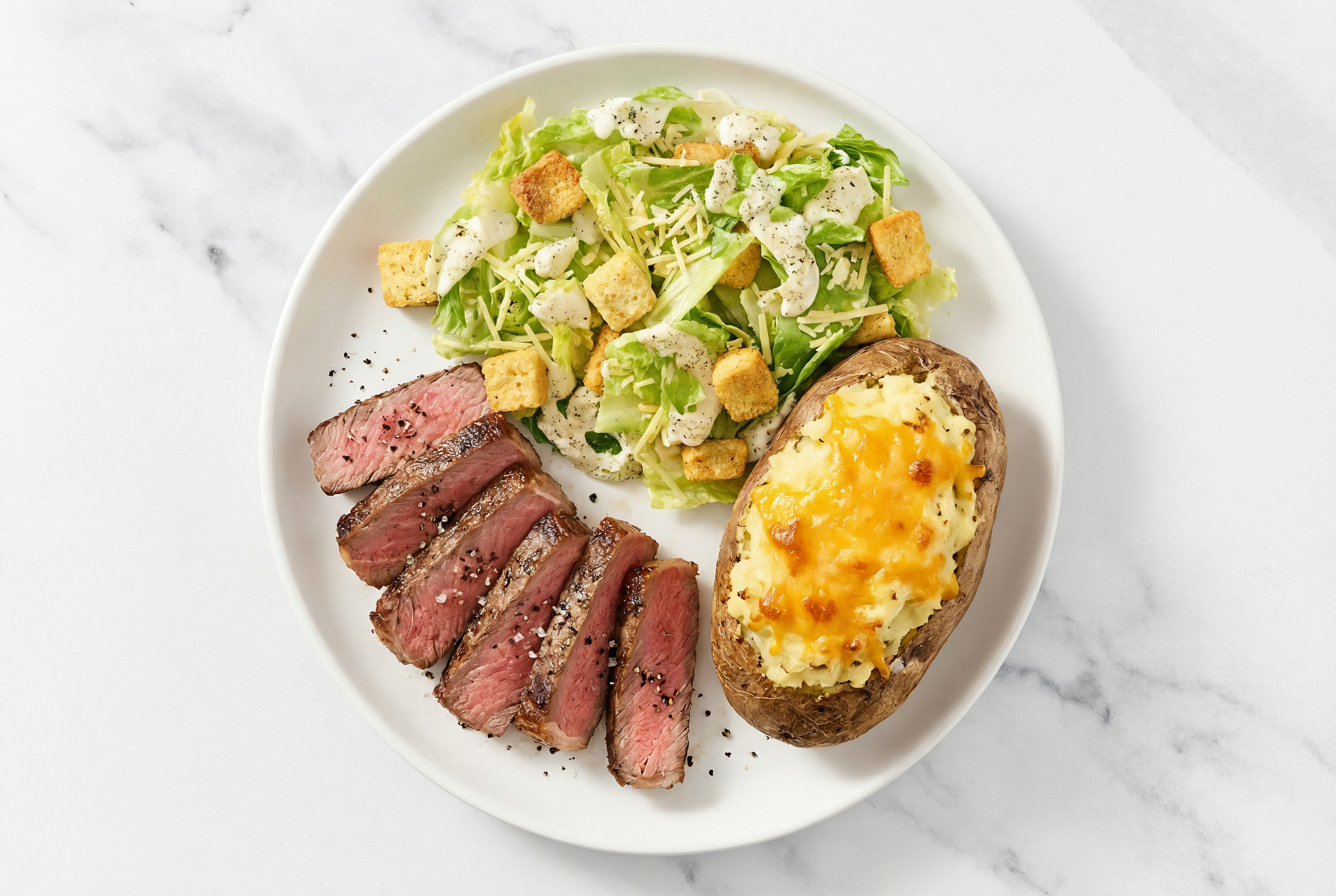 Strip Steak with Caesar Salad + Twice-Baked Potato with Sharp Cheddar Bar