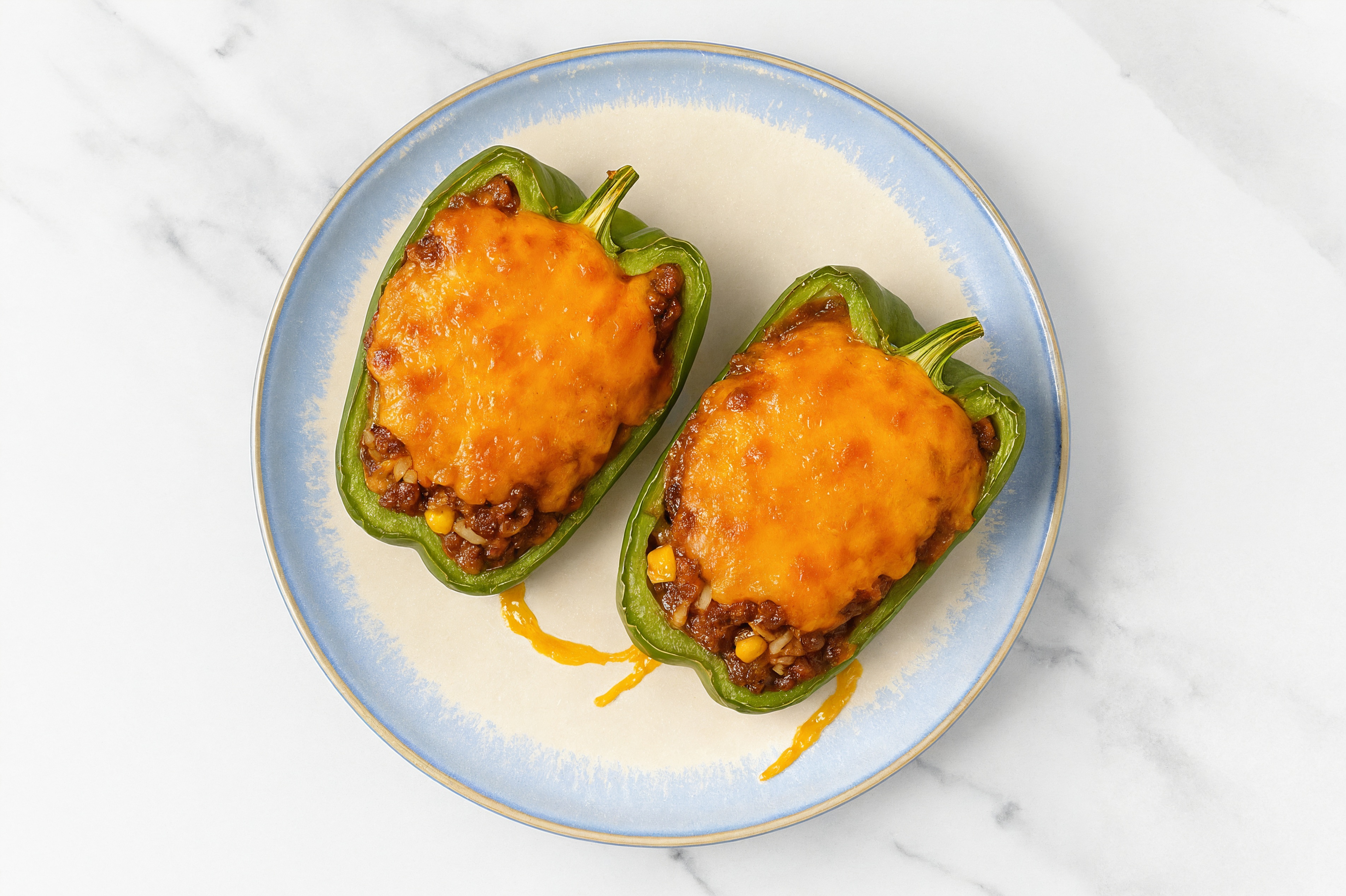 Wagyu Beef Birria Stuffed Peppers with Shredded Sharp Cheddar Cheese