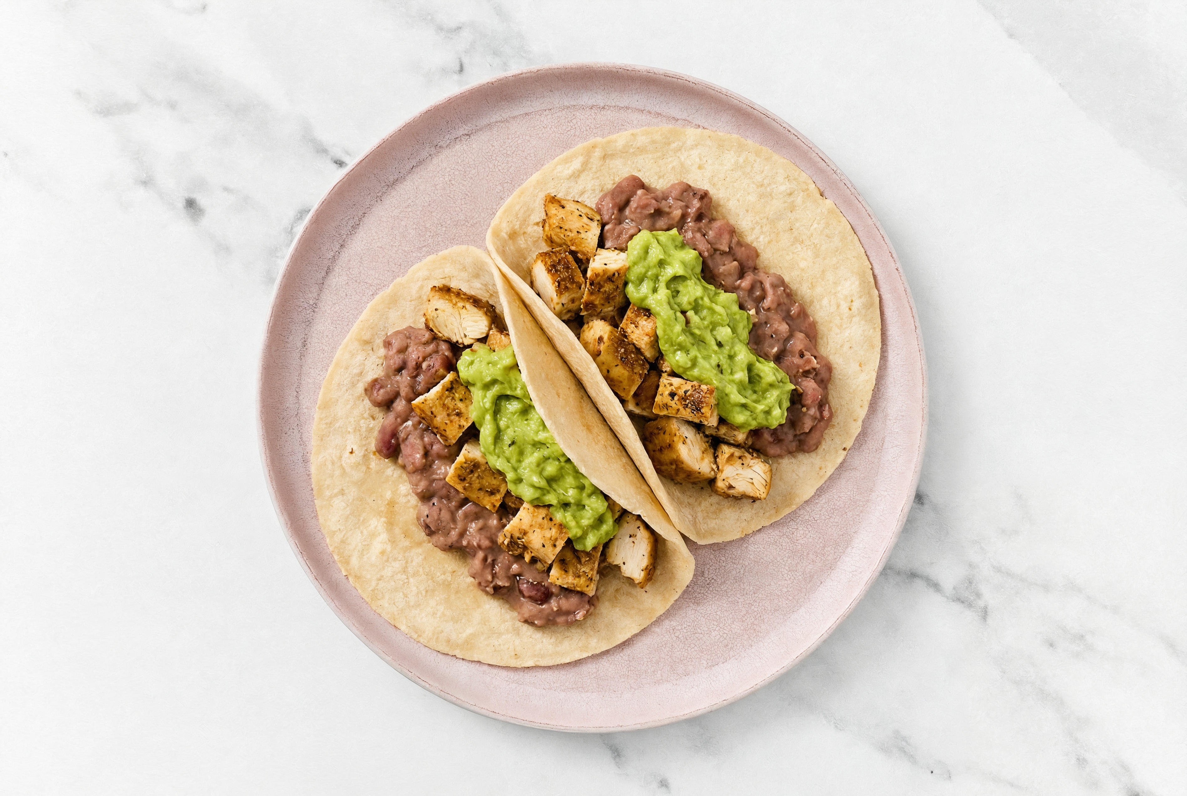 Garlic Chicken Tacos with Guacamole & Refried Red Beans