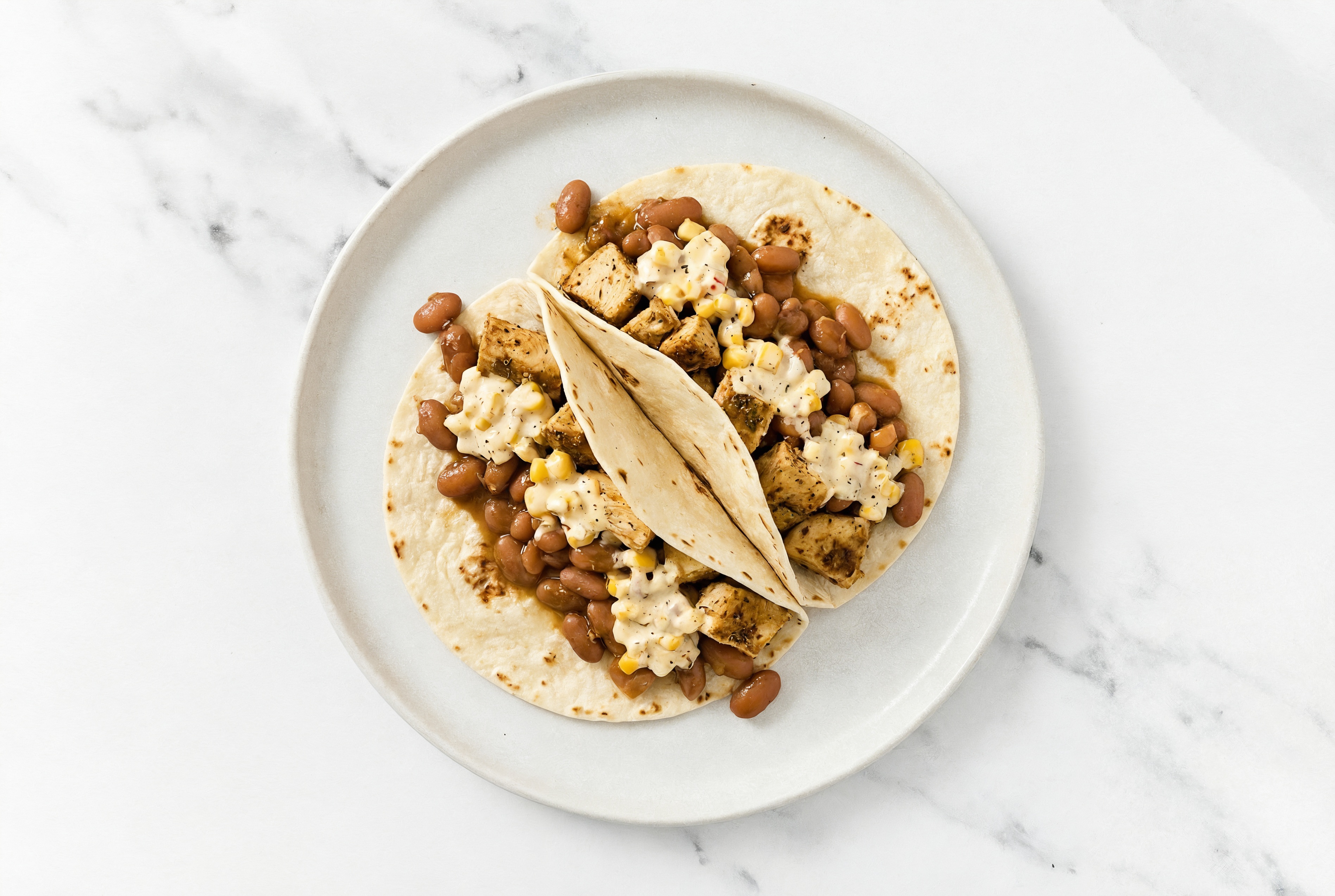 Garlic Chicken Tacos with Street Corn Sauce & Pinto Beans
