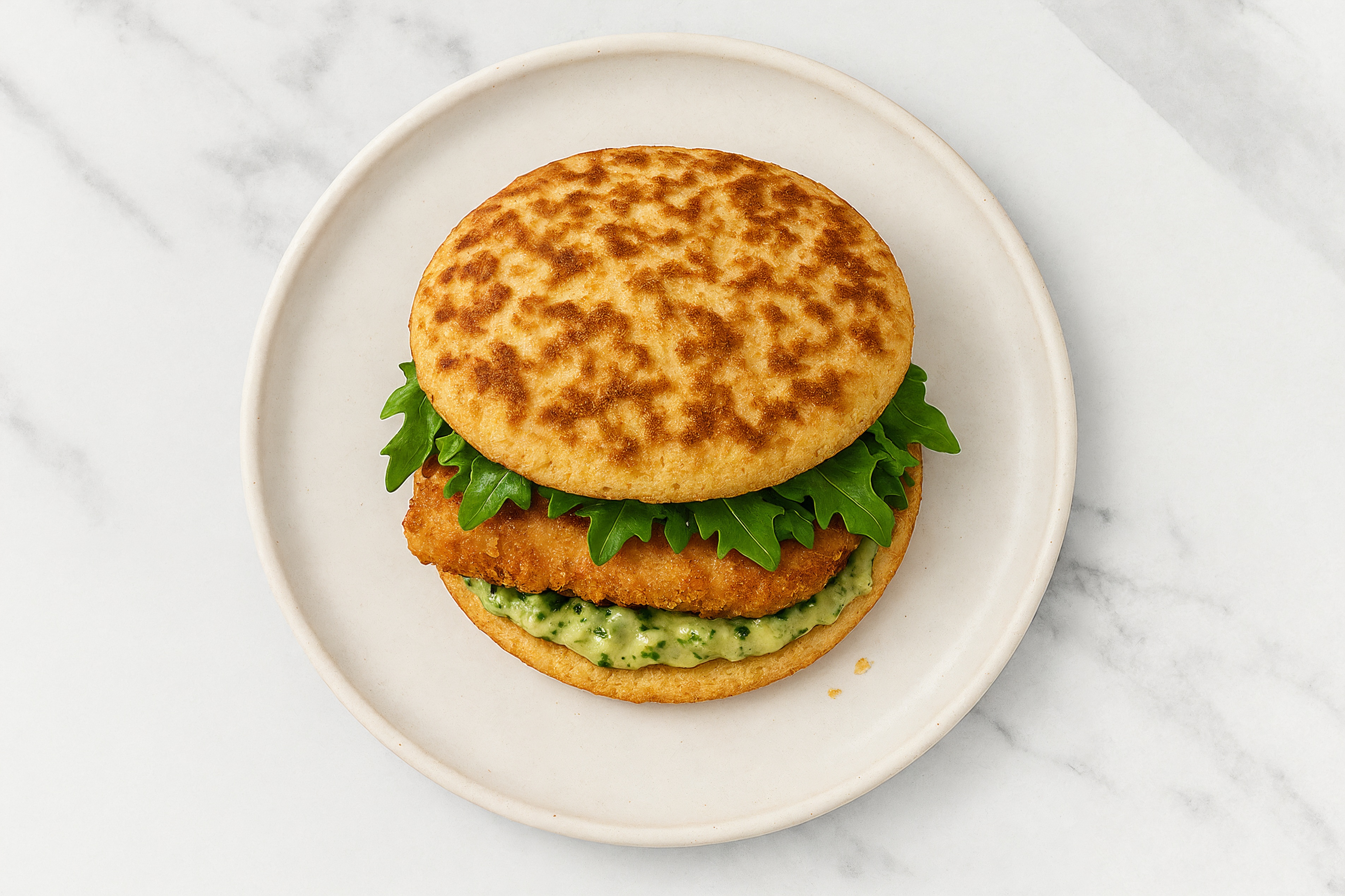 Creamy Artichoke "Chicken" Tenders Sandwich with Spring Mix on Cauliflower Rounds