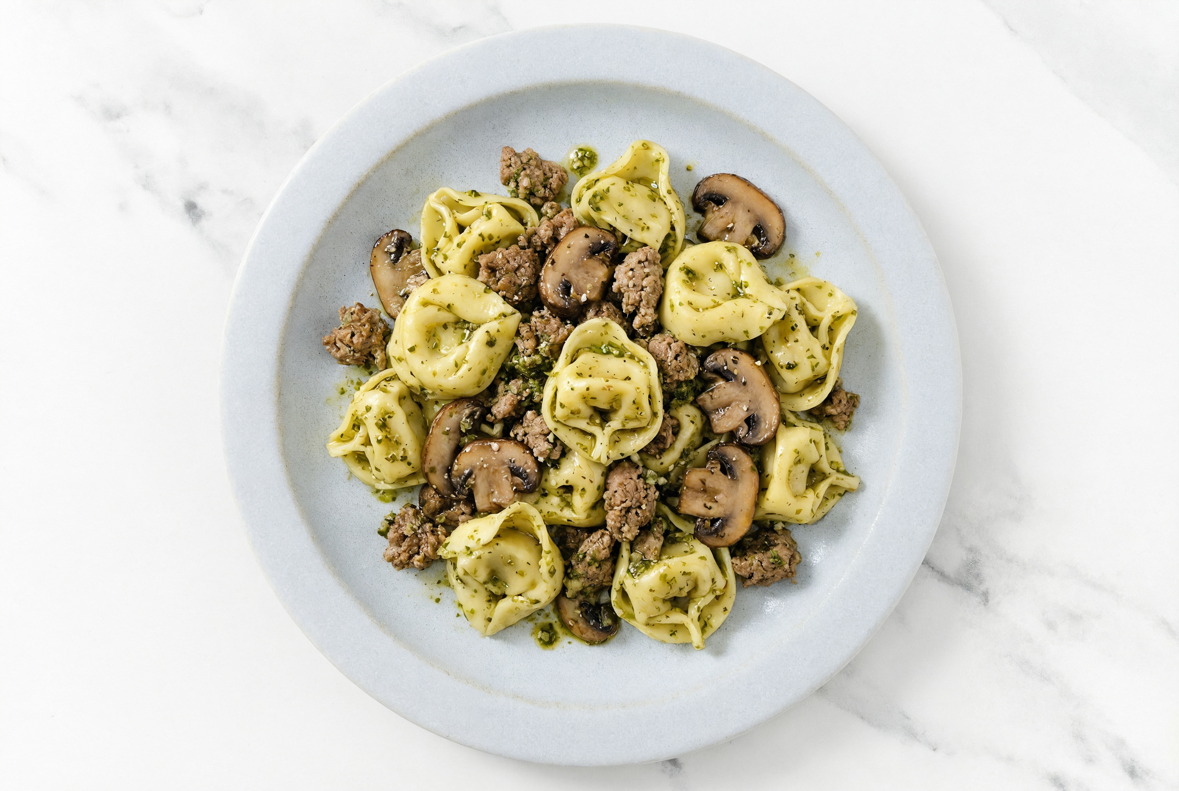 Four Cheese Tortelloni Pesto with Ground Bison & Mushrooms