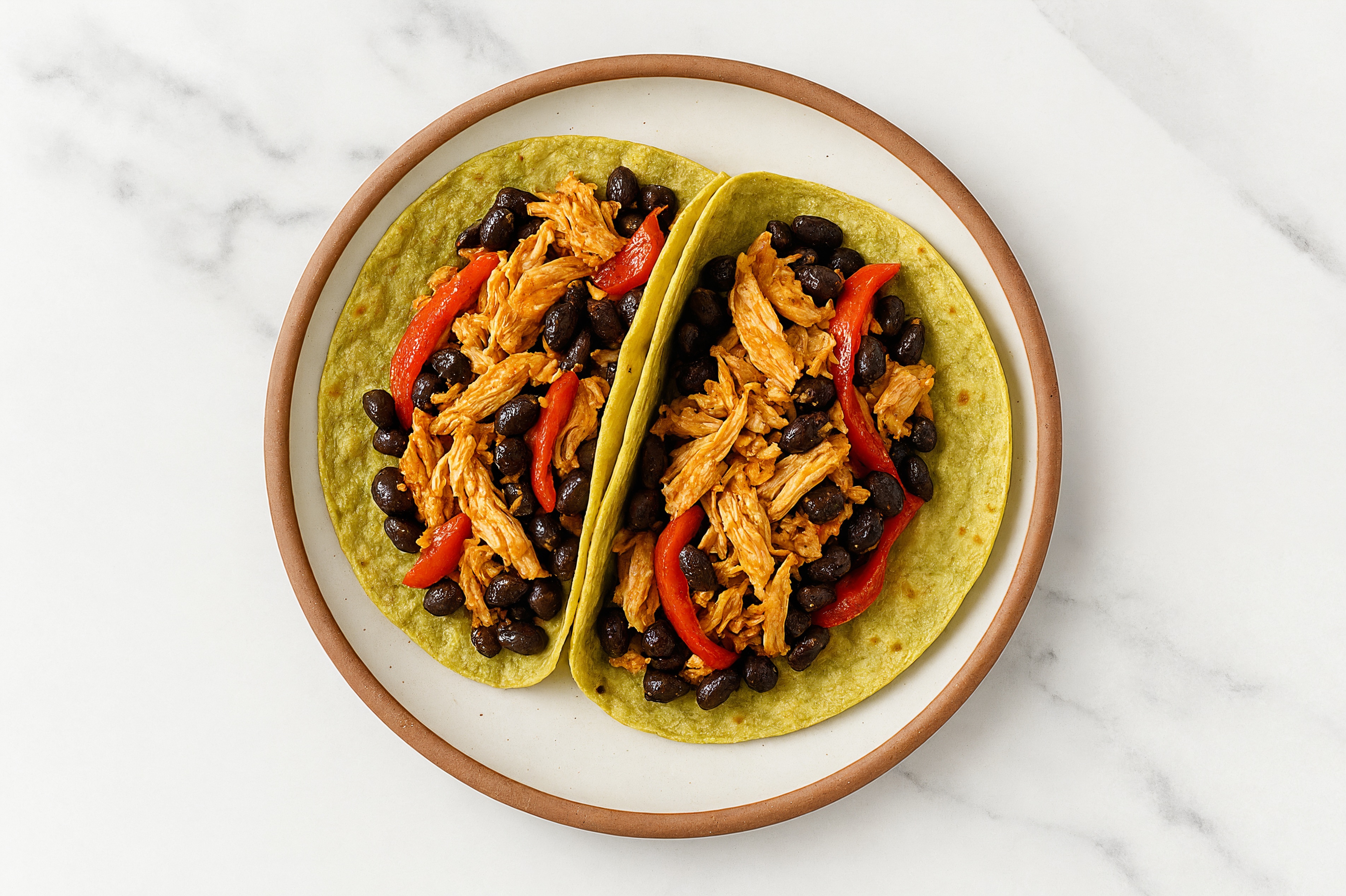 Hearty Chile Chicken + Cuban Spiced Black Beans Bean Tacos