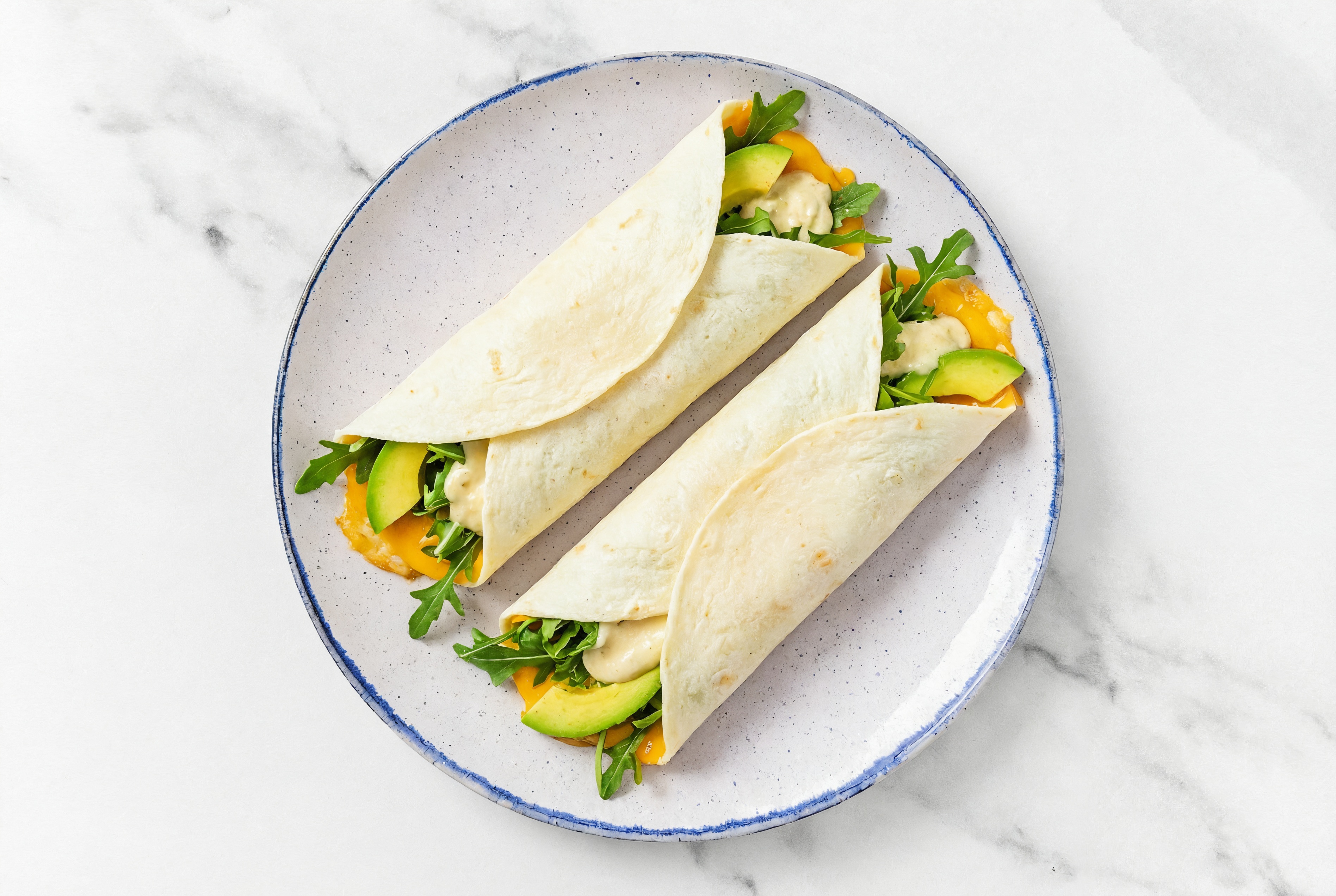 Garlic Avocado + Cheddar Wraps with Arugula