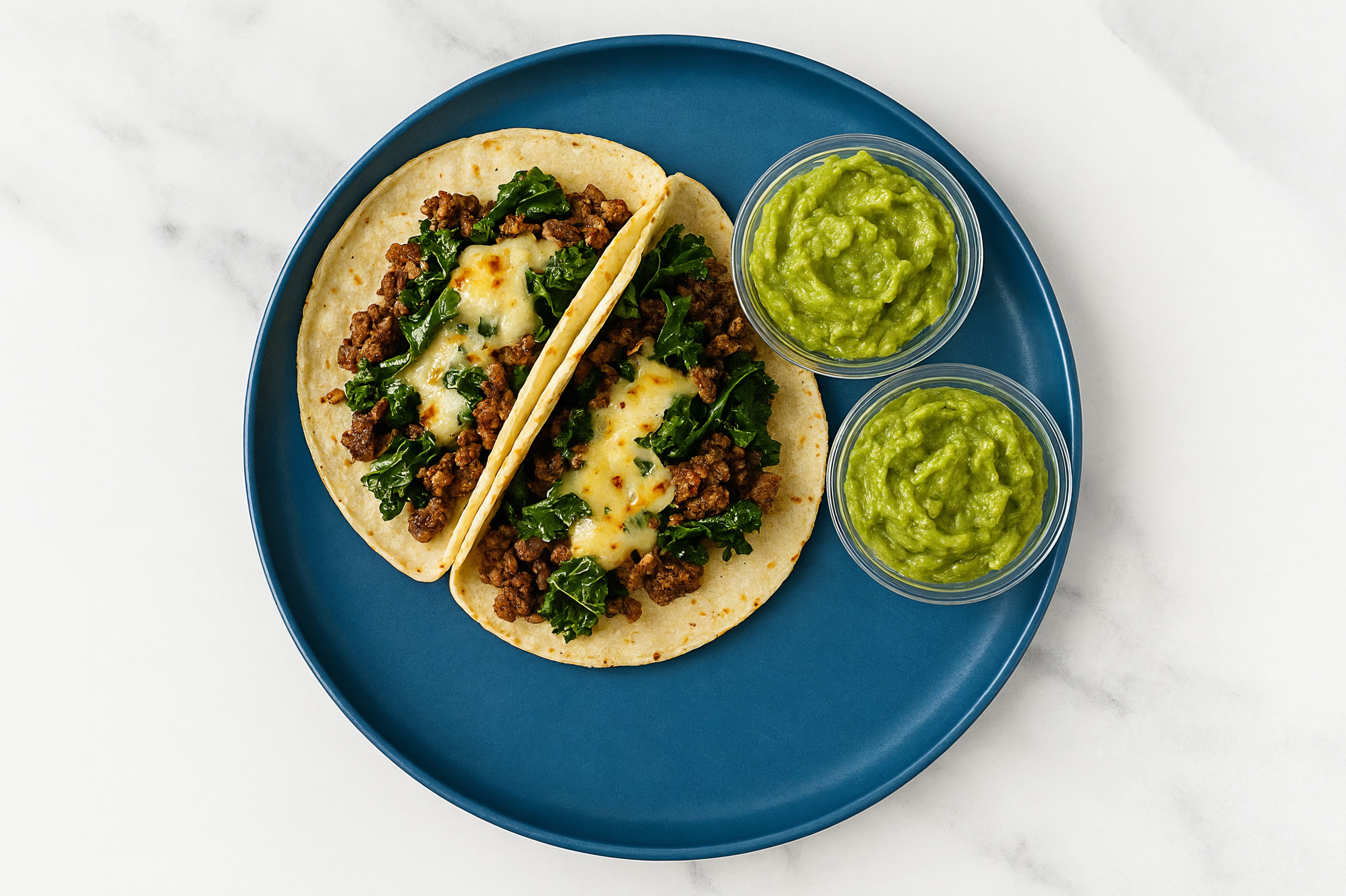 Cheesy Wagyu Beef + Kale Tacos