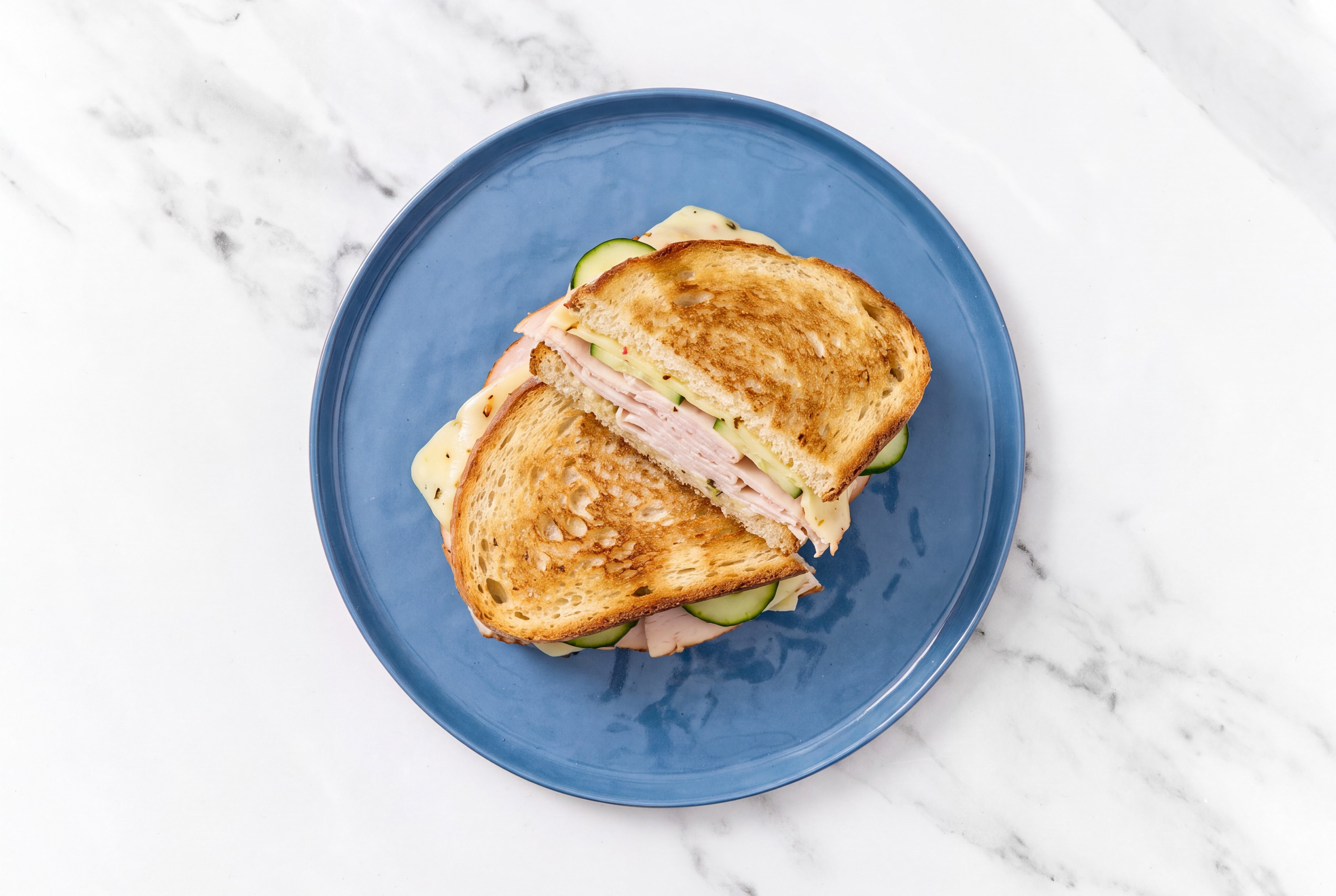 Oven-Roasted Sliced Turkey Breast + Cucumber Sandwich with Potato Bread + Pepper Jack Cheese