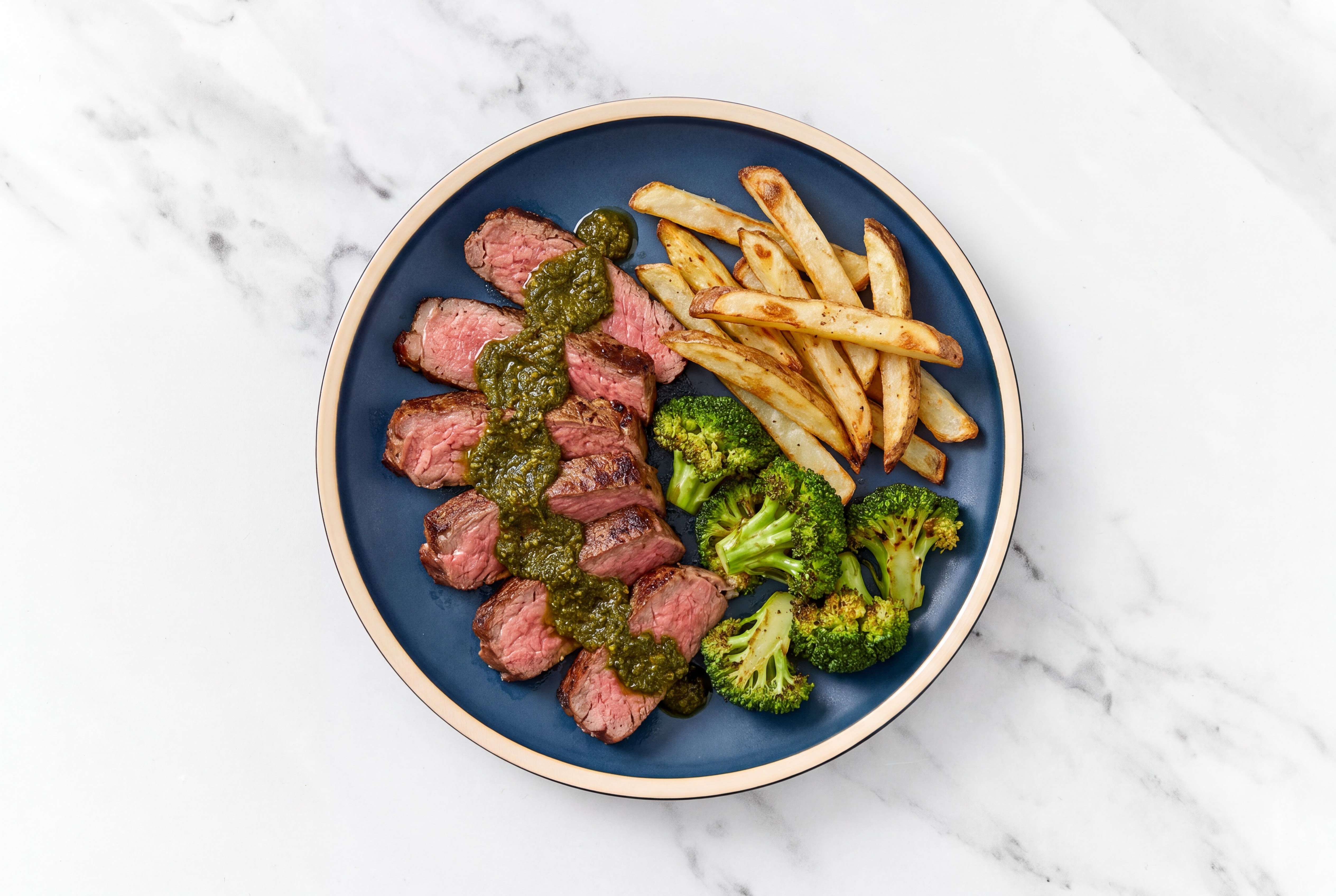 Zhoug Sirloin with Broccoli + Fries