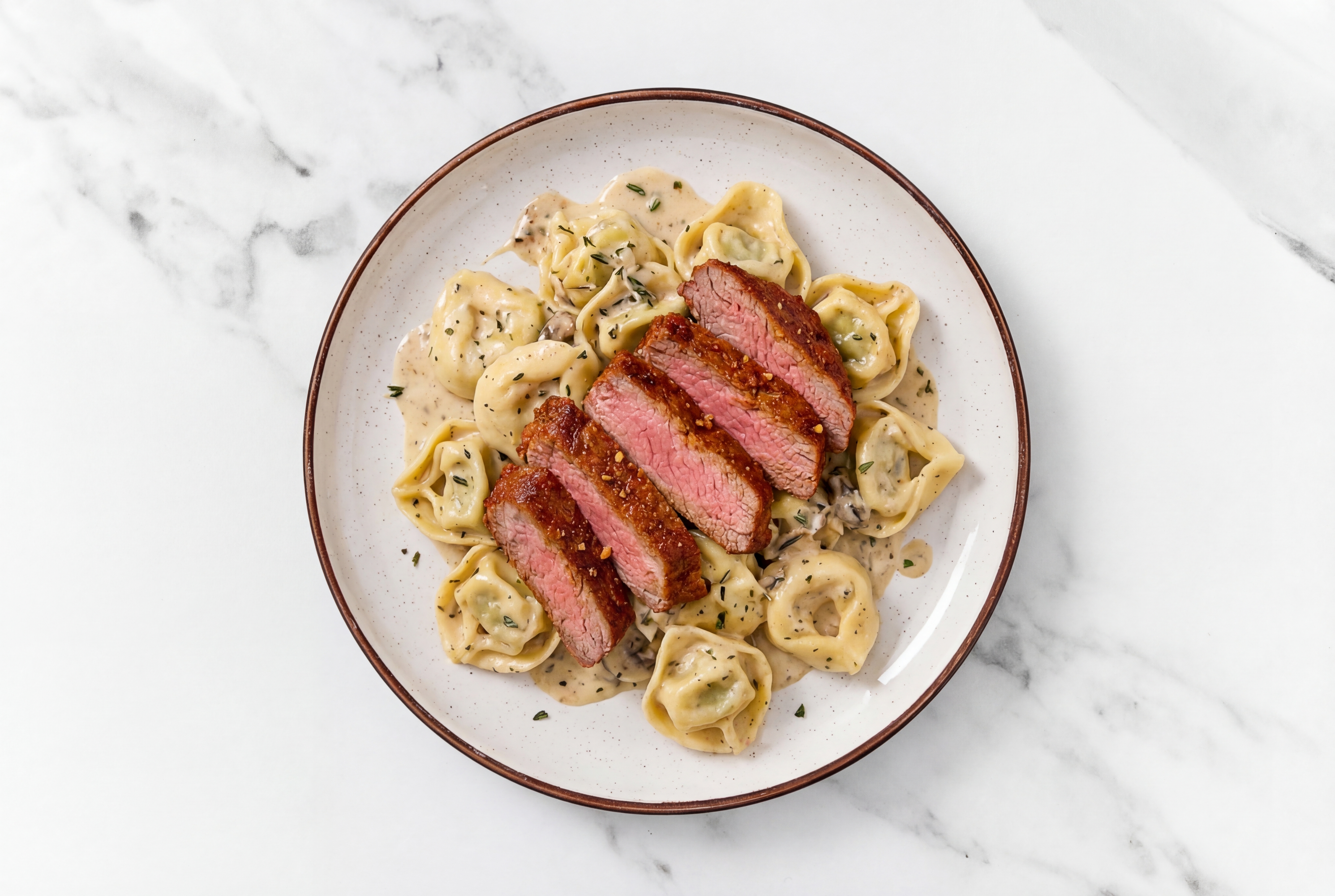 Steakhouse Tortellini Truffle with Adobo Marinated Flank Steak