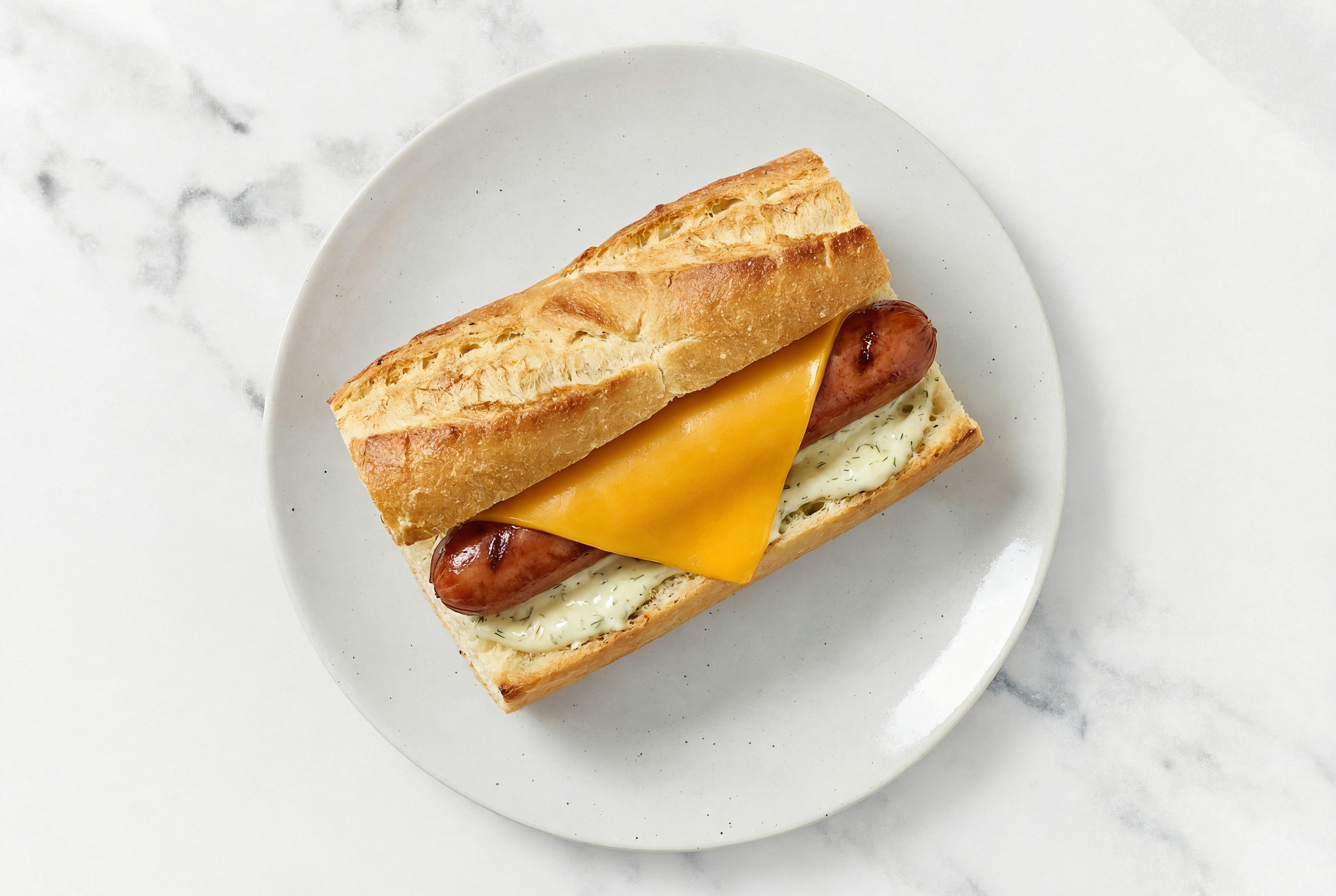 Cheddar Beef Hot Dog with Garlic Sauce on Baguette