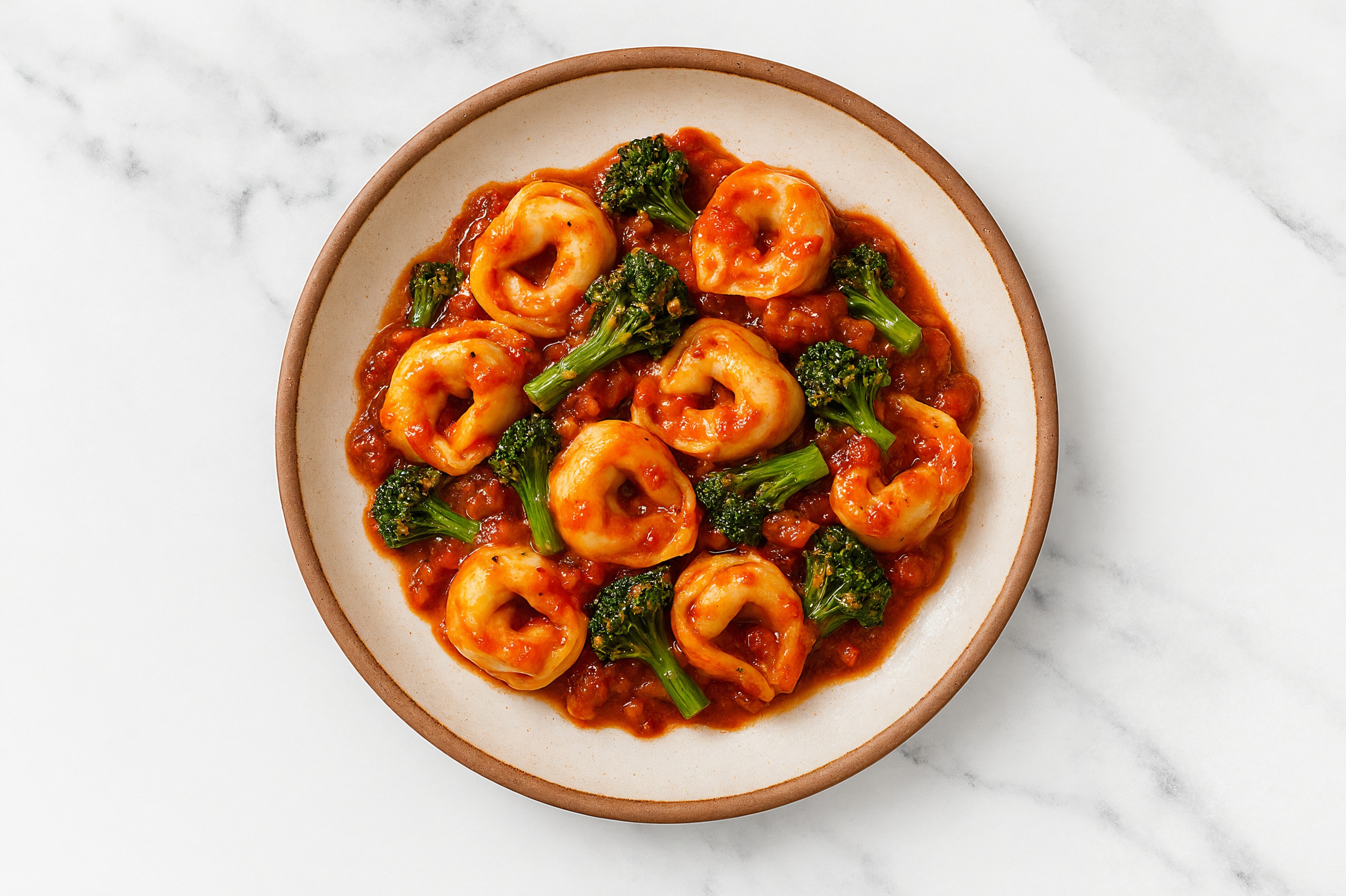 Saucy Marinara Tortelloni with Sweet Baby Broccoli