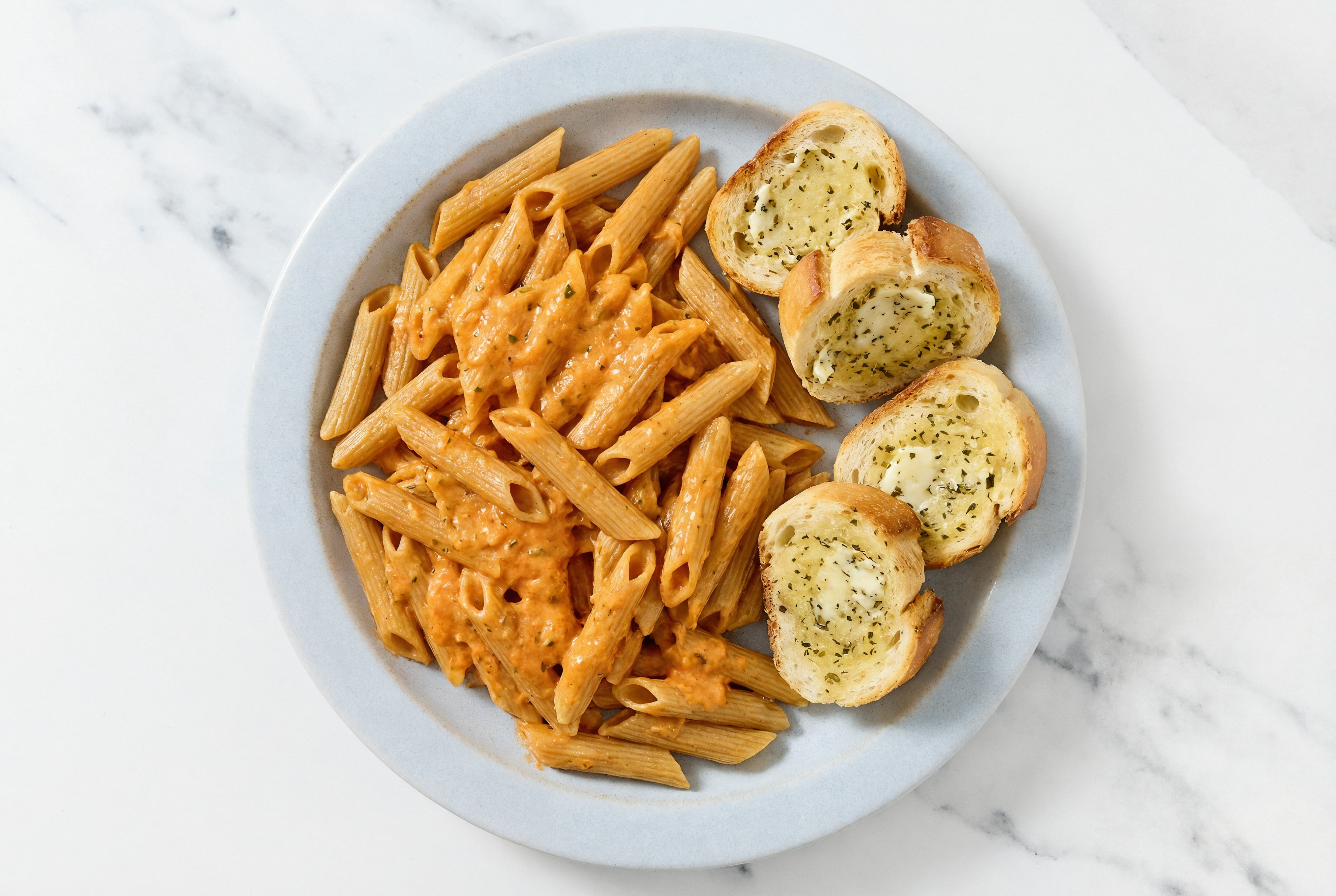 Hearty Sourdough Penne Rigate alla Vodka + Herby Garlic Bread