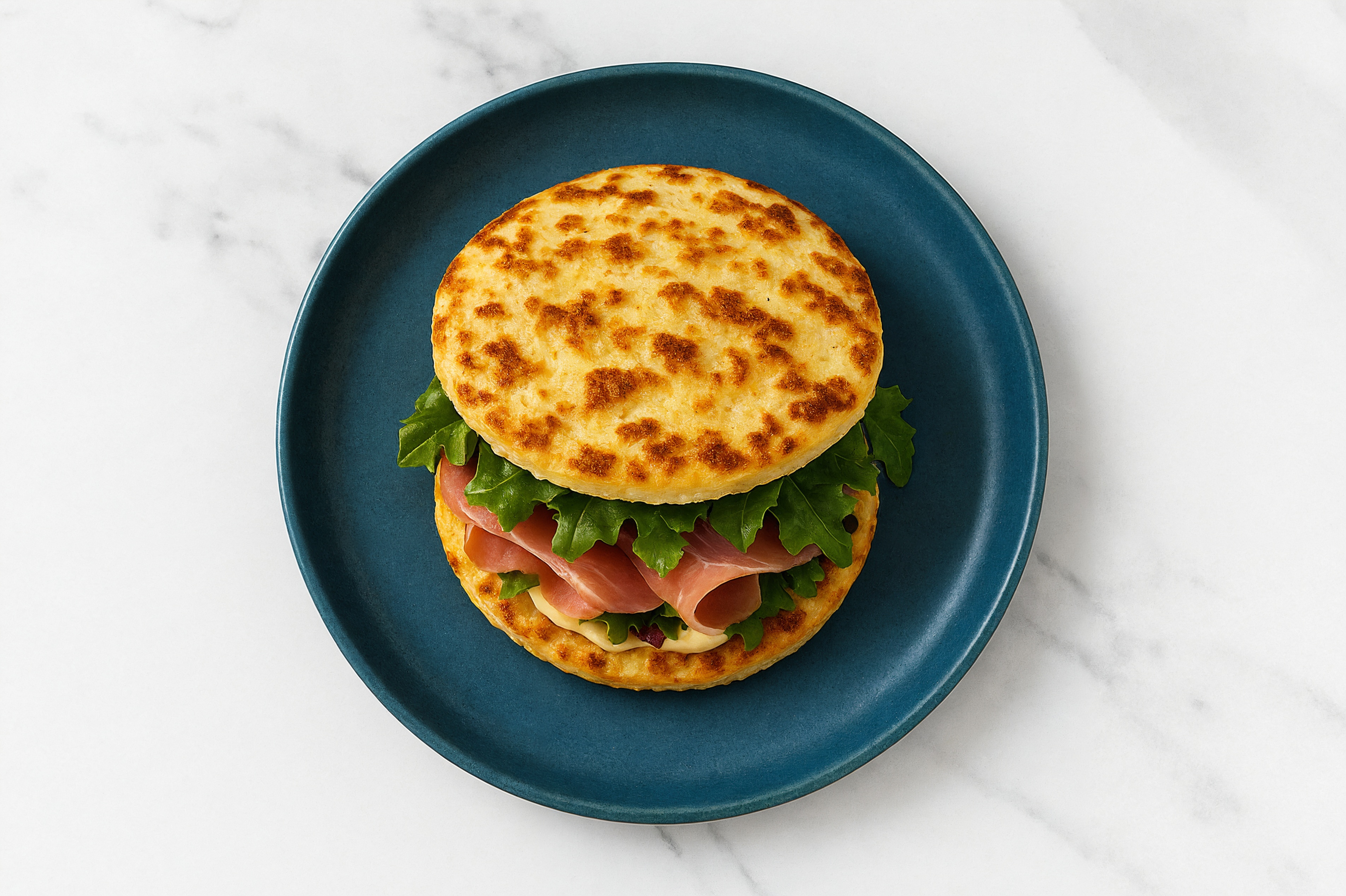 Creamy Horseradish Prosciutto Sandwich with Spring Mix on Cauliflower Rounds