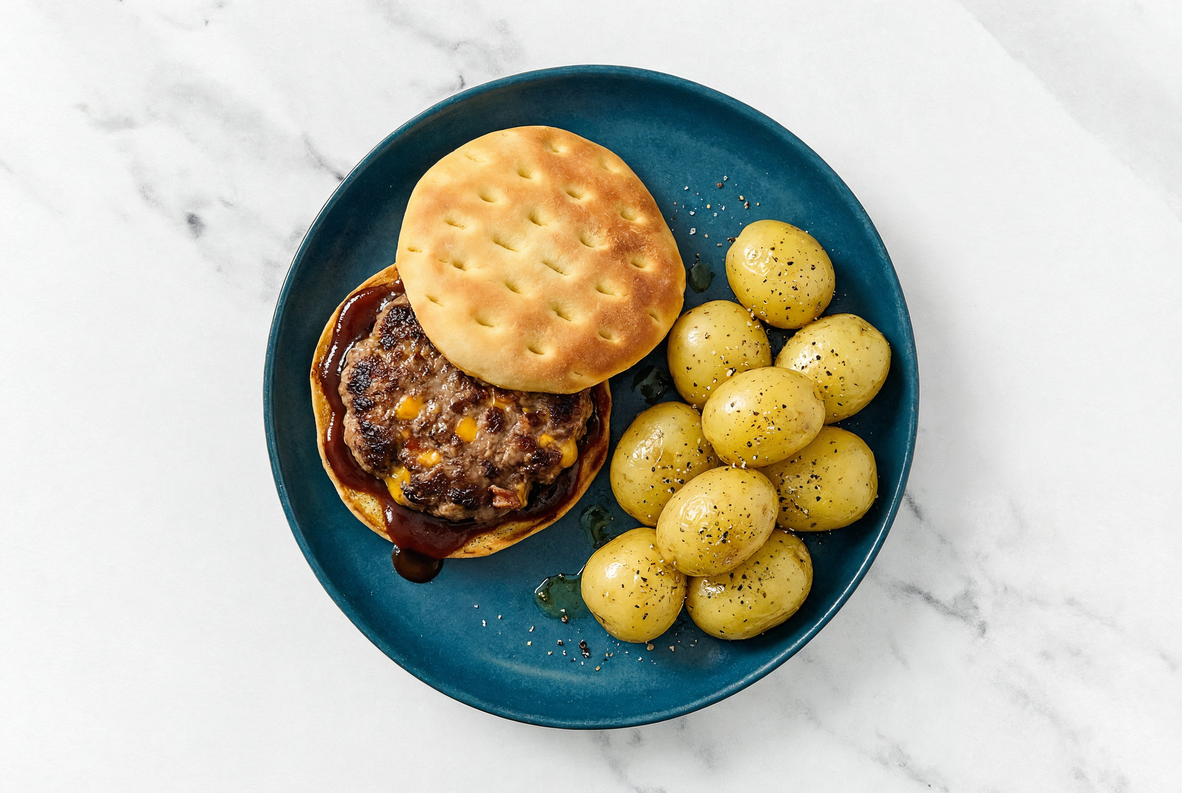Savory BBQ Bacon + Cheddar Burger with Yellow Potatoes