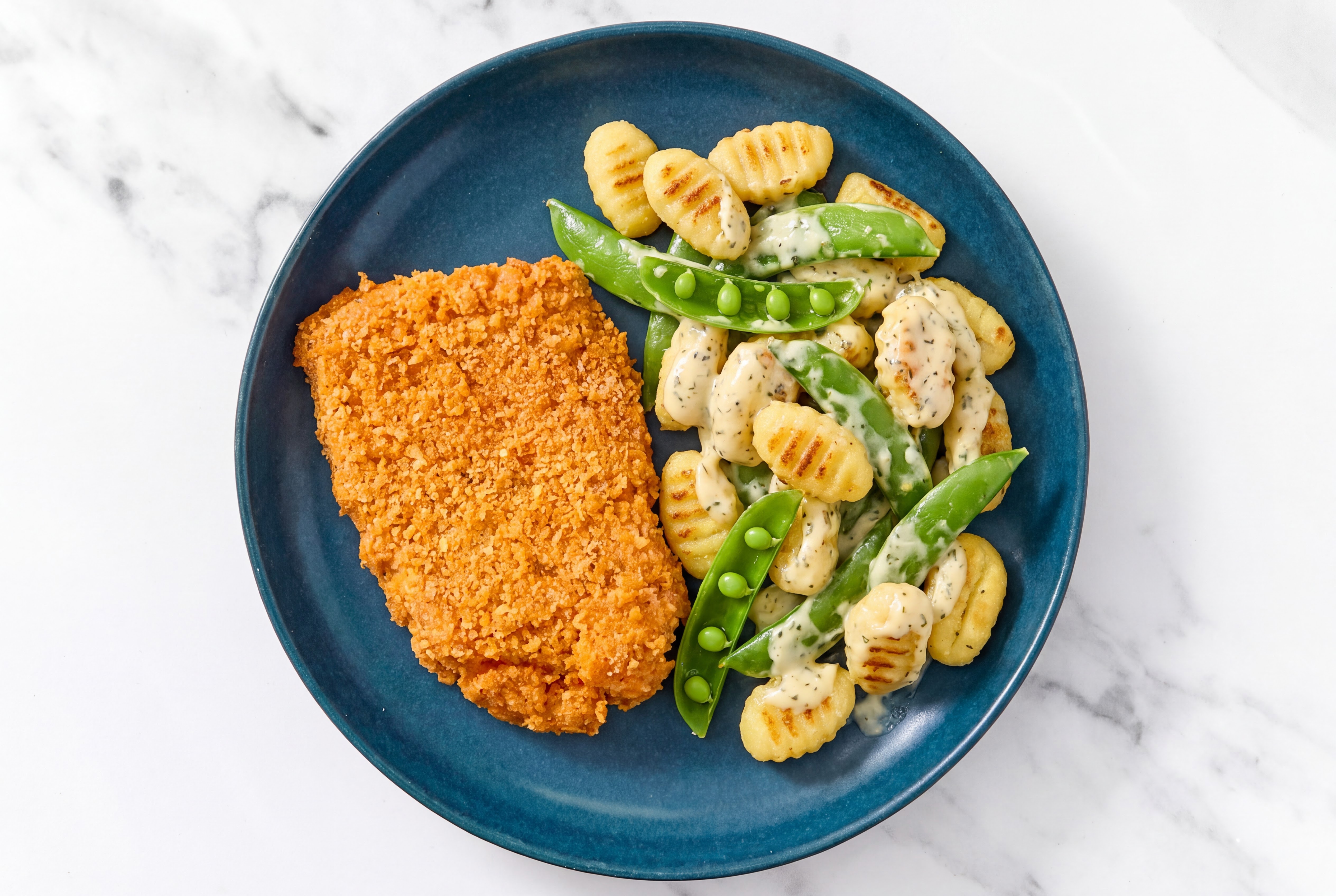 Crispy Hot Honey Chicken over Creamy Gnocchi with Snap Peas
