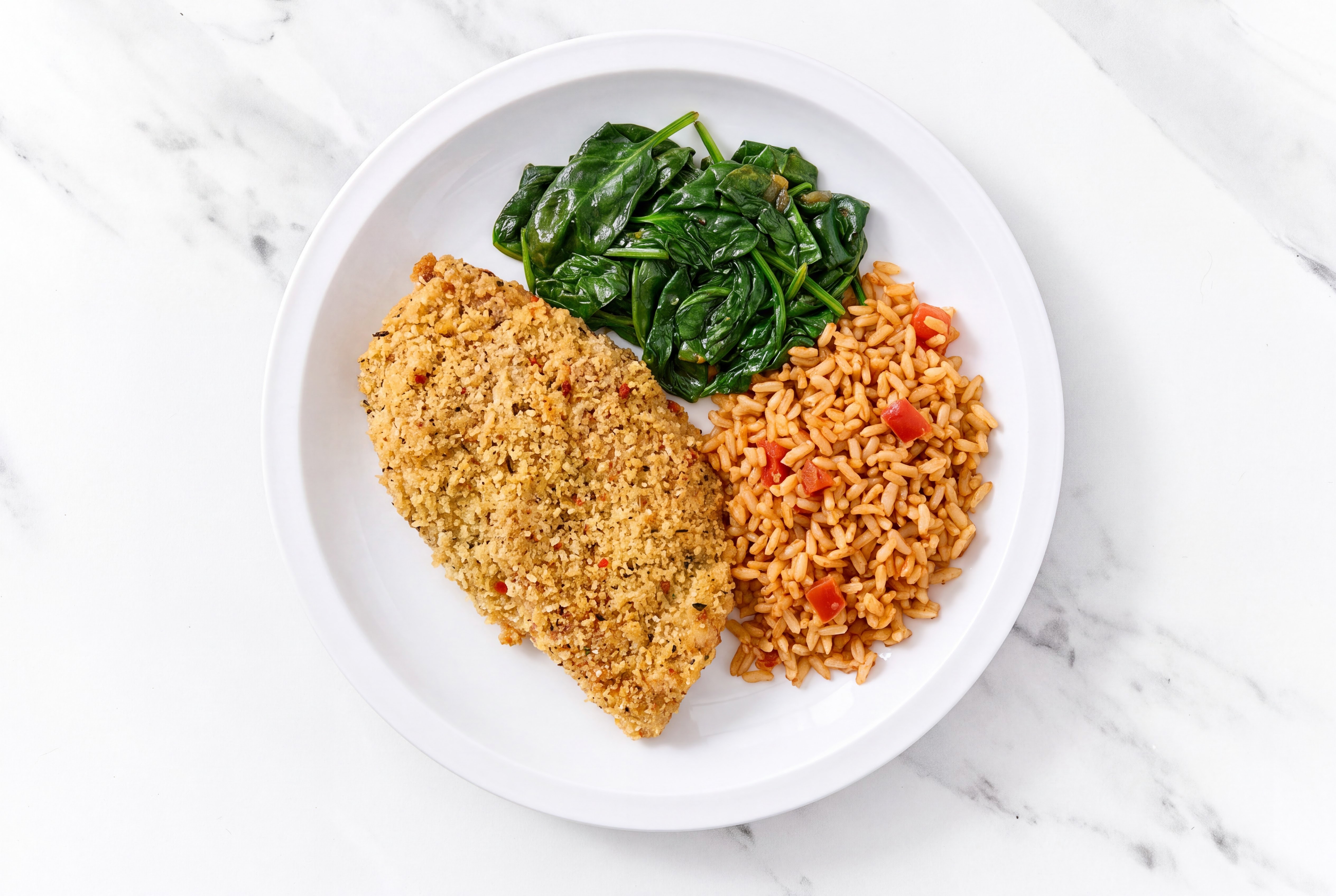 Parmesan Breaded Chicken Cutlet with Baby Spinach & Mexican Rice