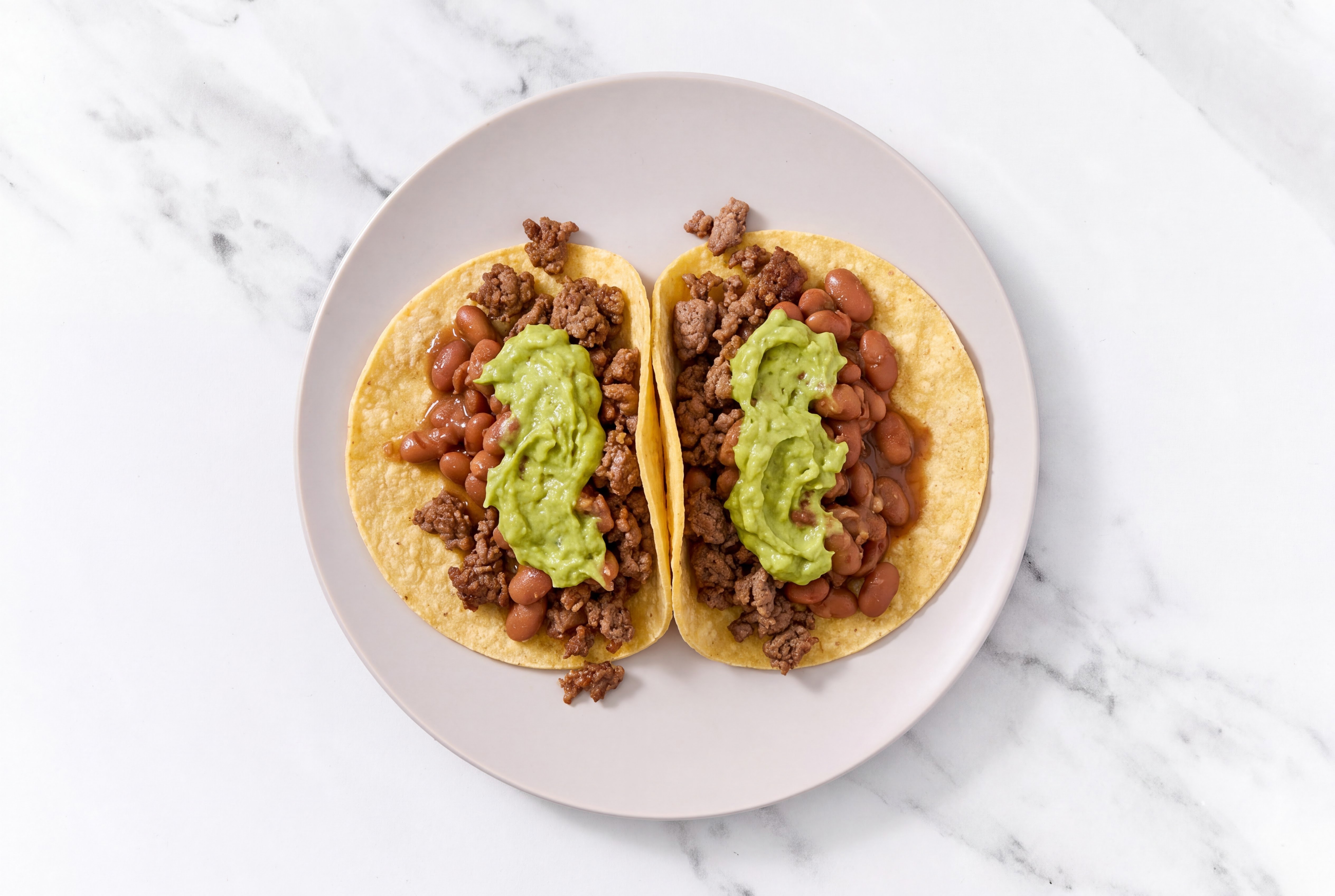 Herby Ground 93/7 Lean Beef Tacos with Avocado & Pinto Beans