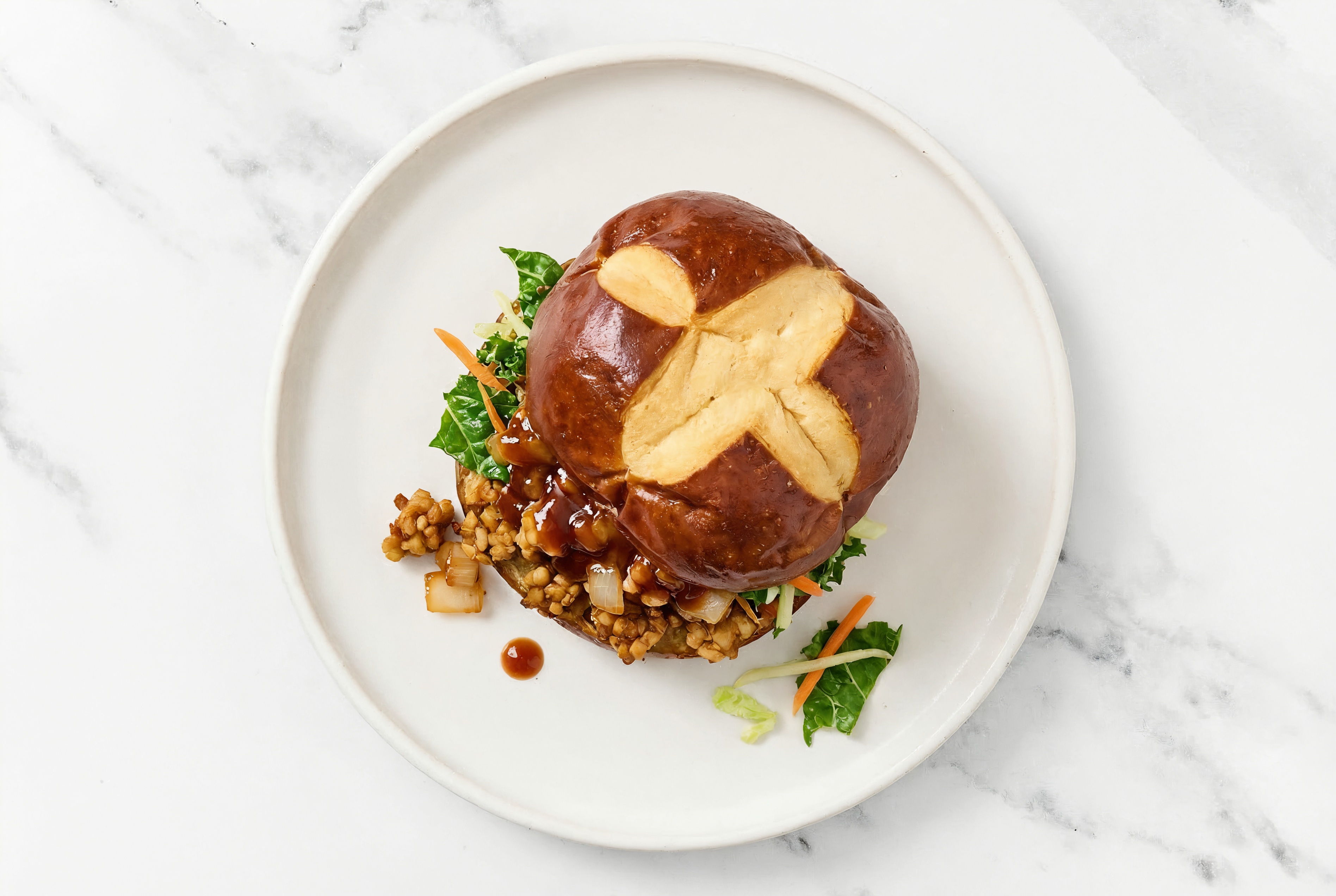 Tempeh Sloppy Joes on Pretzel Bun with Original BBQ Sauce