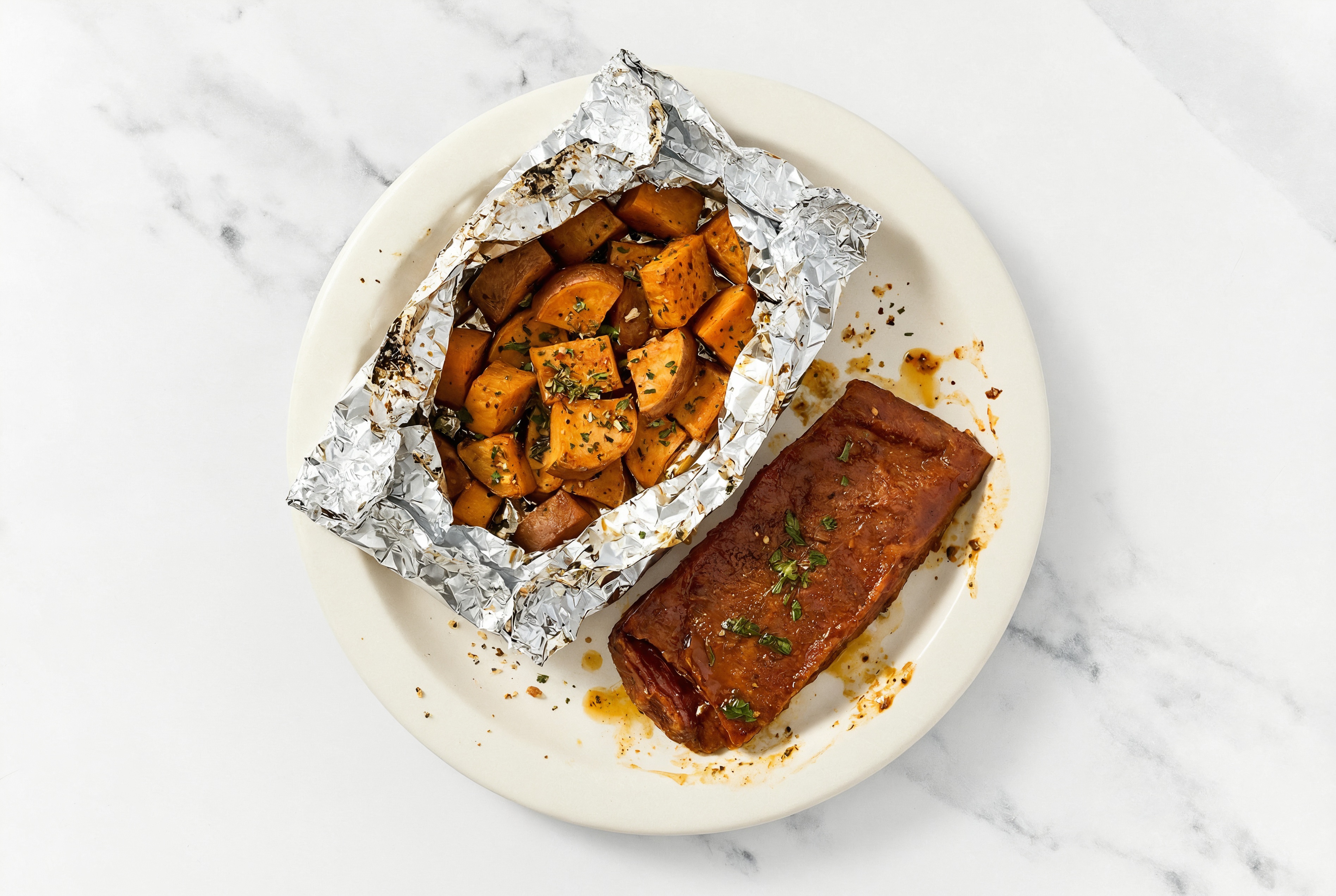 Seared Adobo Marinated Flank Steak + Easy-Cleanup Garlicky Sweet Potatoes