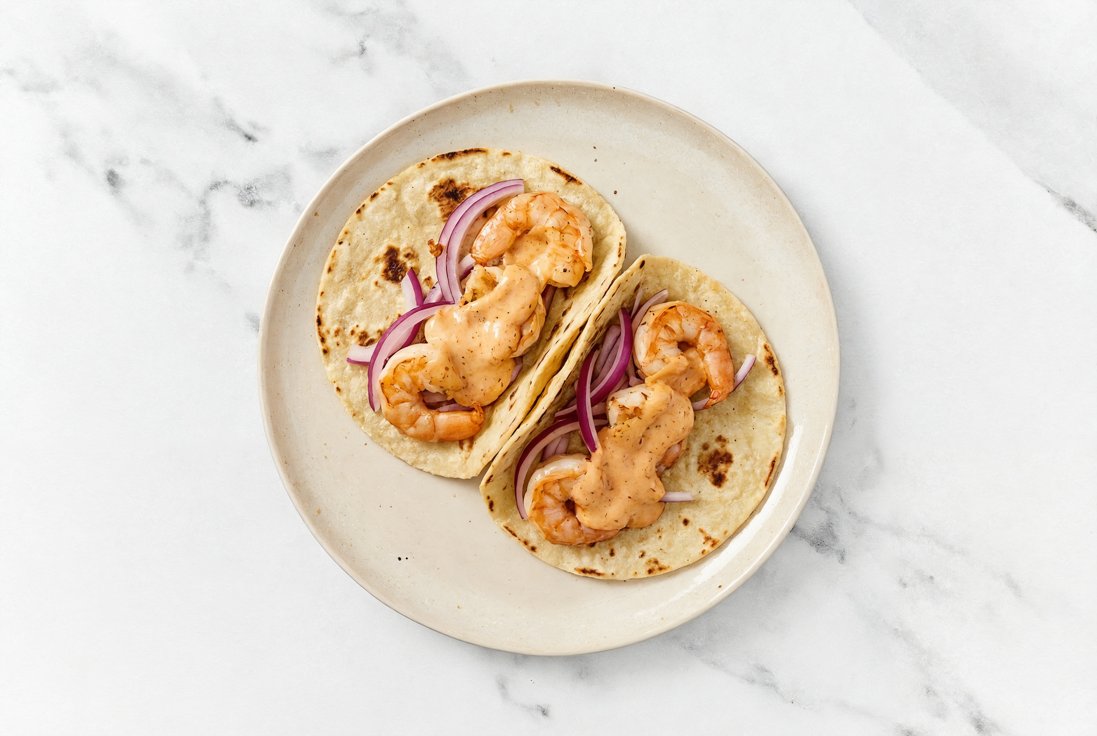 Hearty Bang Jumbo Shrimp Tacos with Red Onion