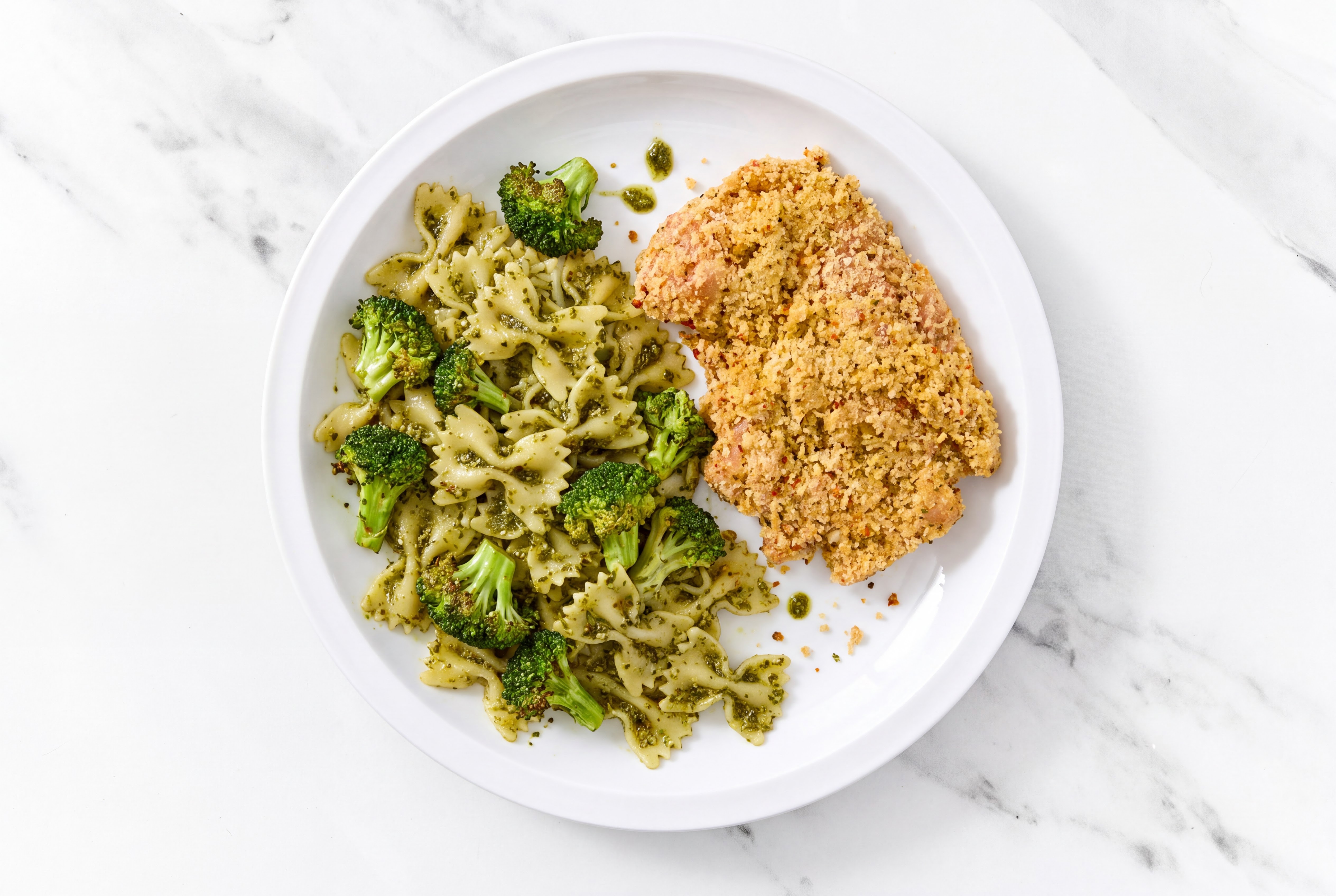 Crispy Garlic Chicken over Pesto Farfalle with Broccoli