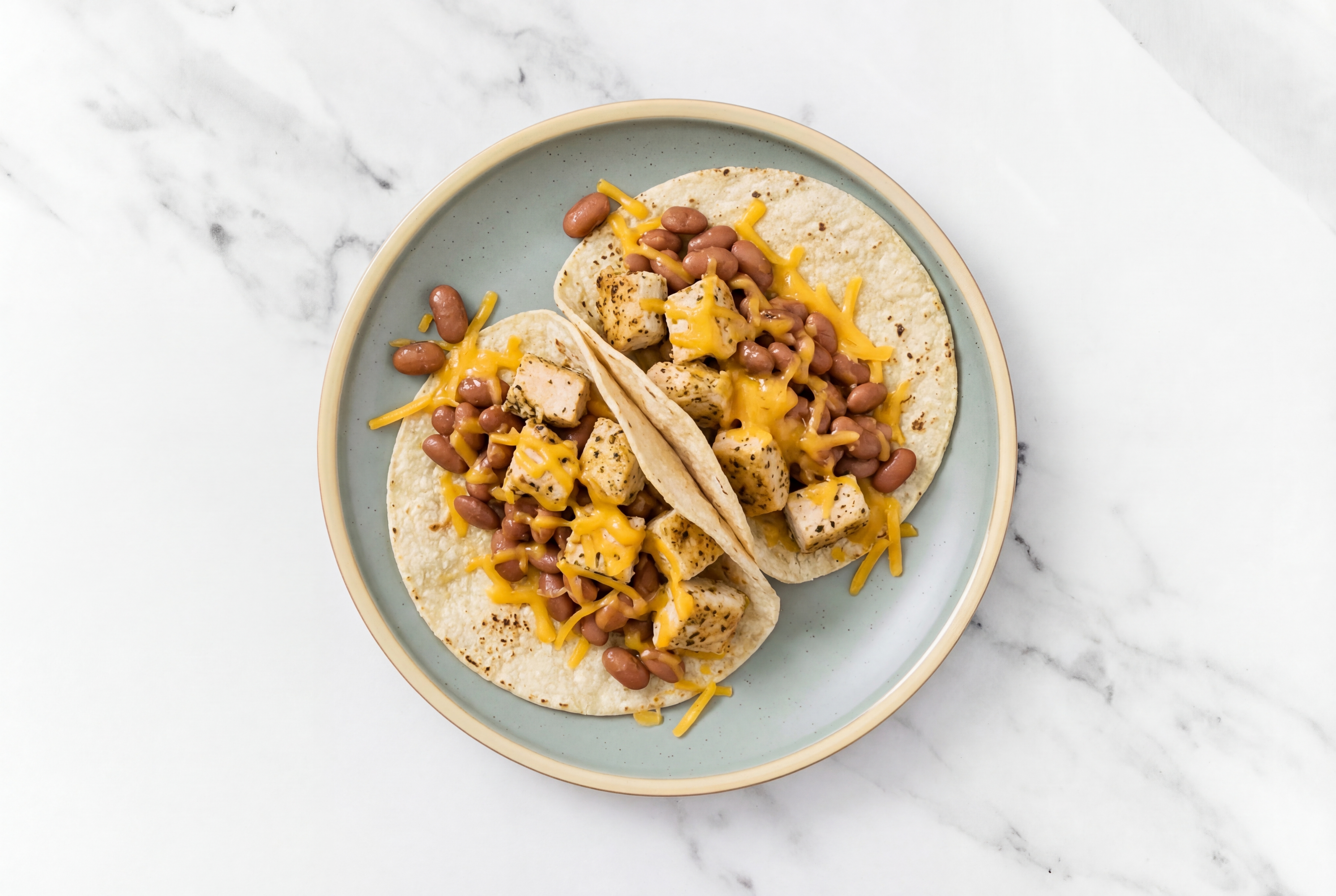 Hearty Garlic Chicken Tacos with Cheddar Cheese & Pinto Beans