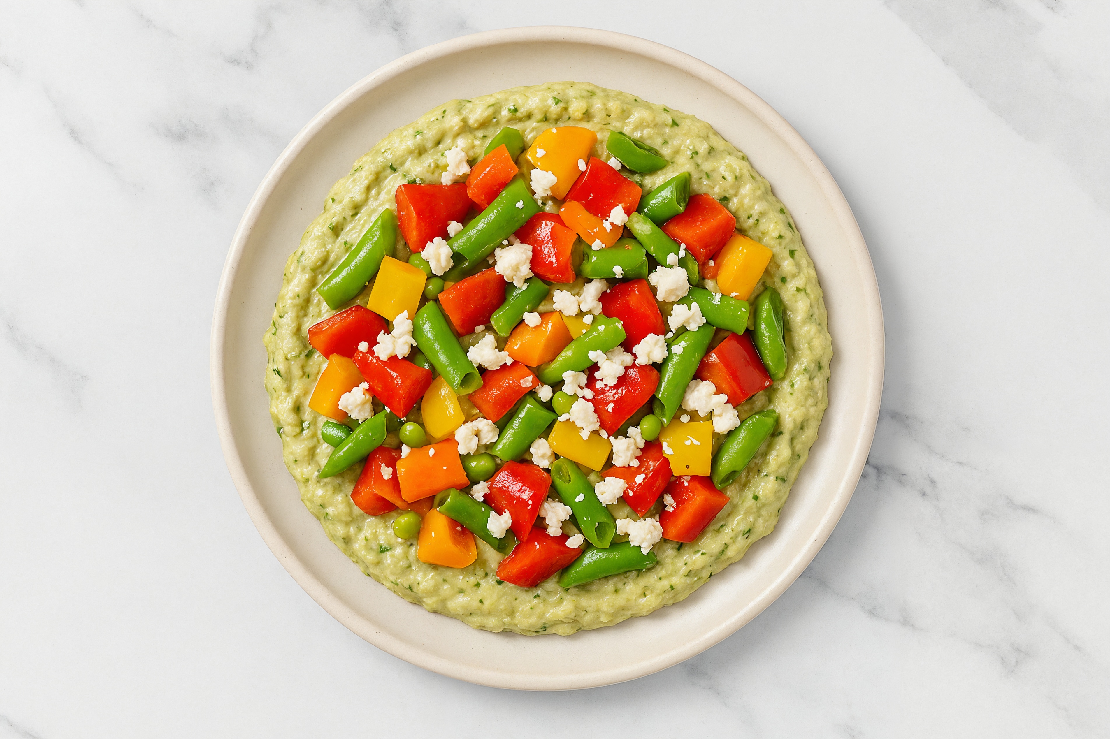 Feta Sweet Pepper Snap Pea Bowl over Spinach Artichoke Dip