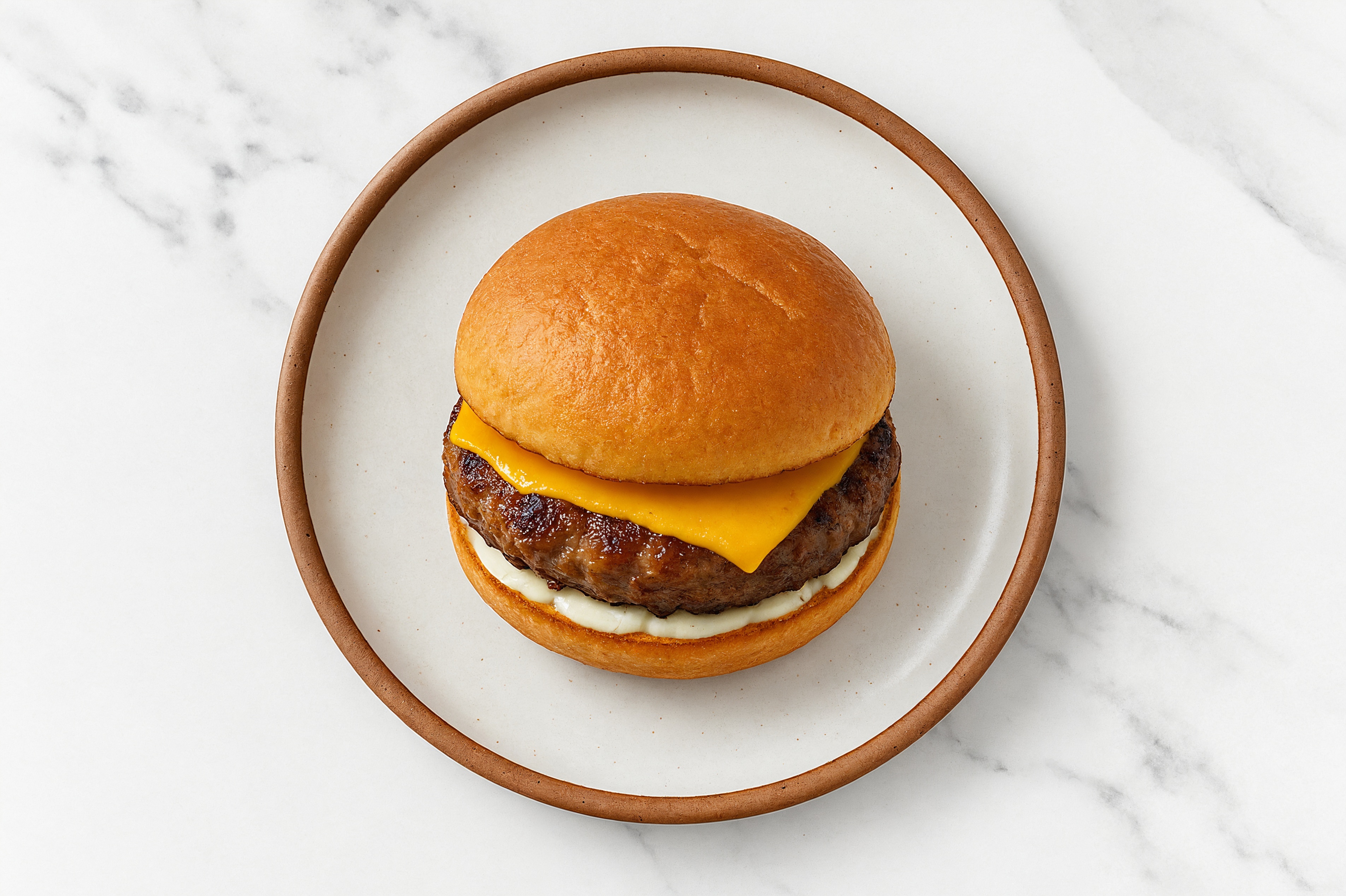 Lamb Burger on Gluten-Free Bun with Tzatziki & Cheddar