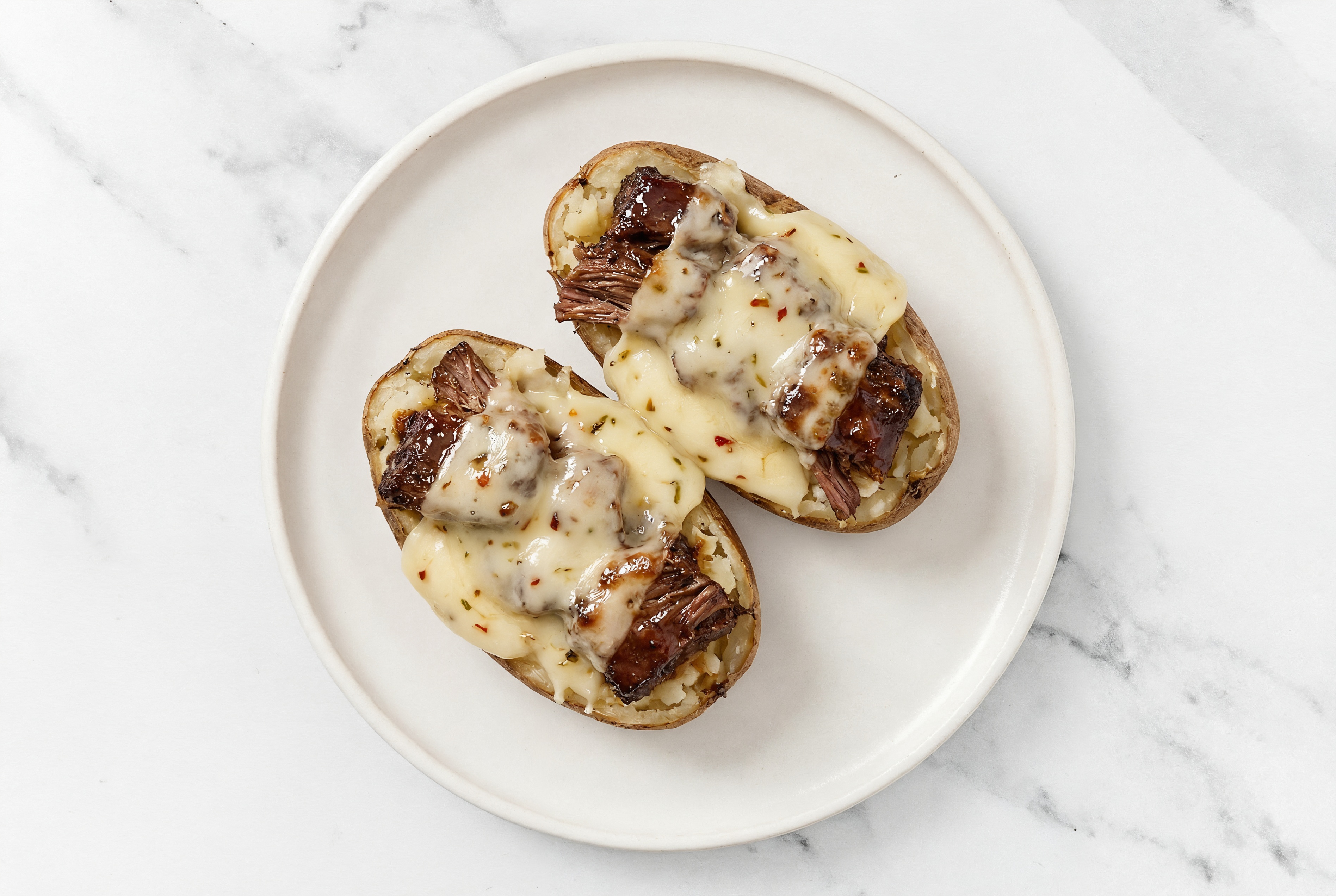 Melty Pepper Jack Short Rib Stuffed Potato