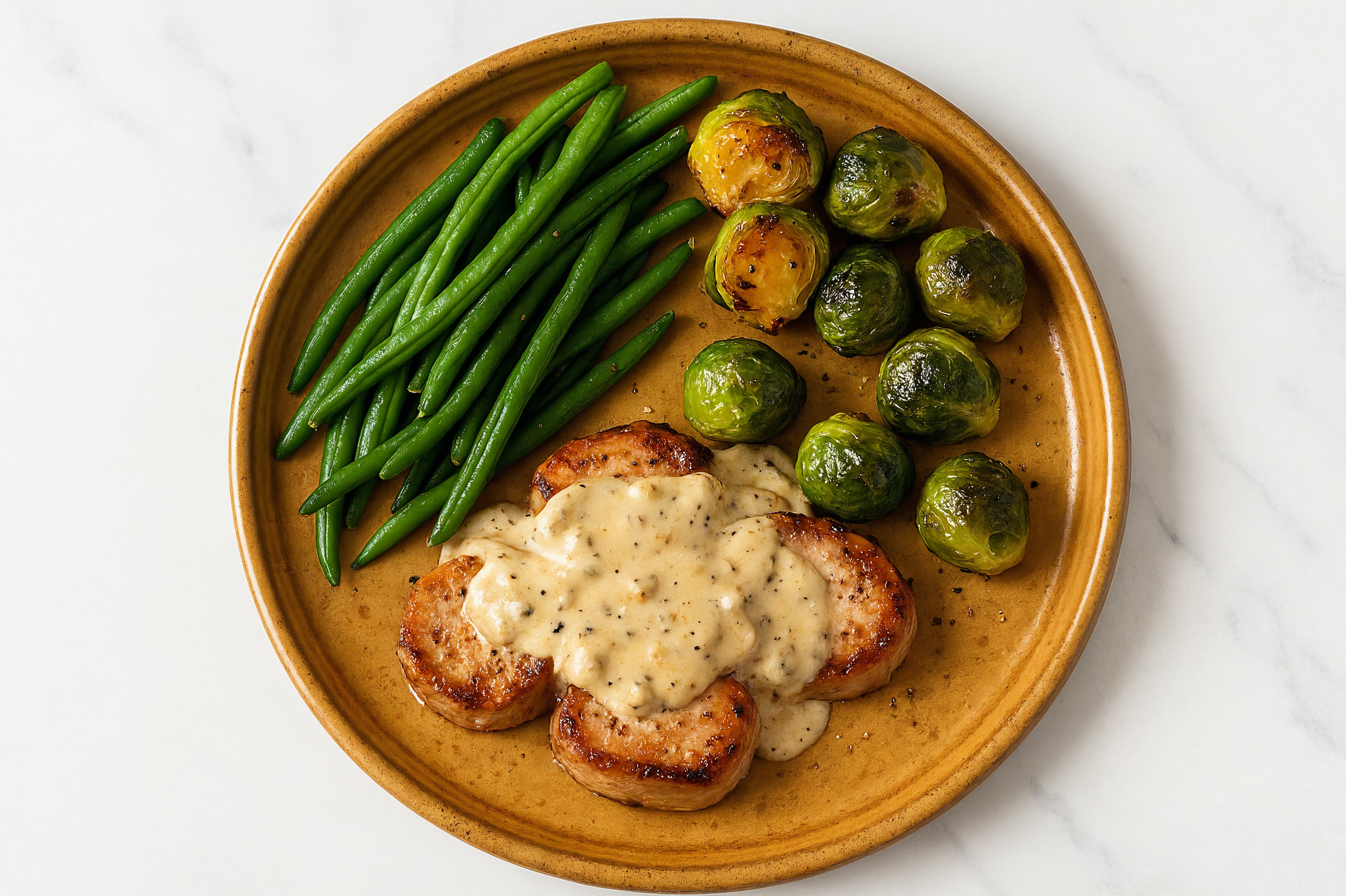Creamy Truffle Smothered Pork Tenderloin with Green Beans & Roasted Brussels