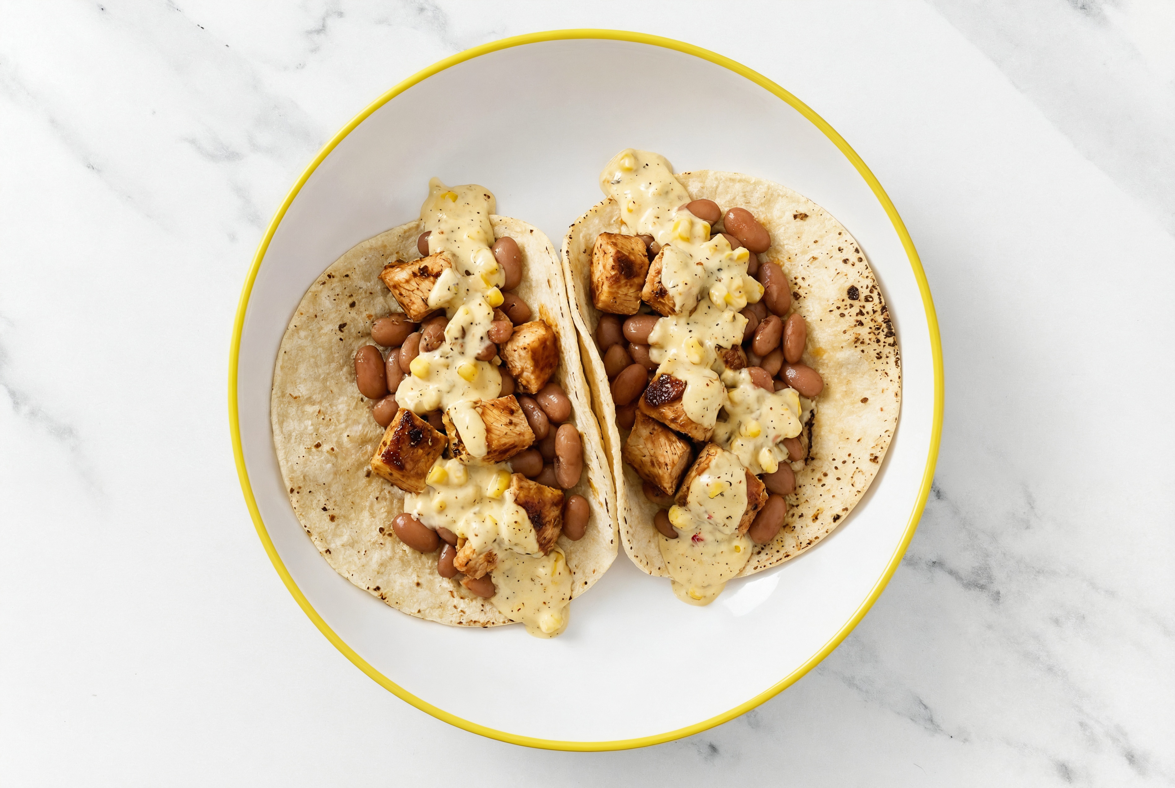 Chipotle Chicken Tacos with Street White Corn Tortillas Sauce & Pinto Beans