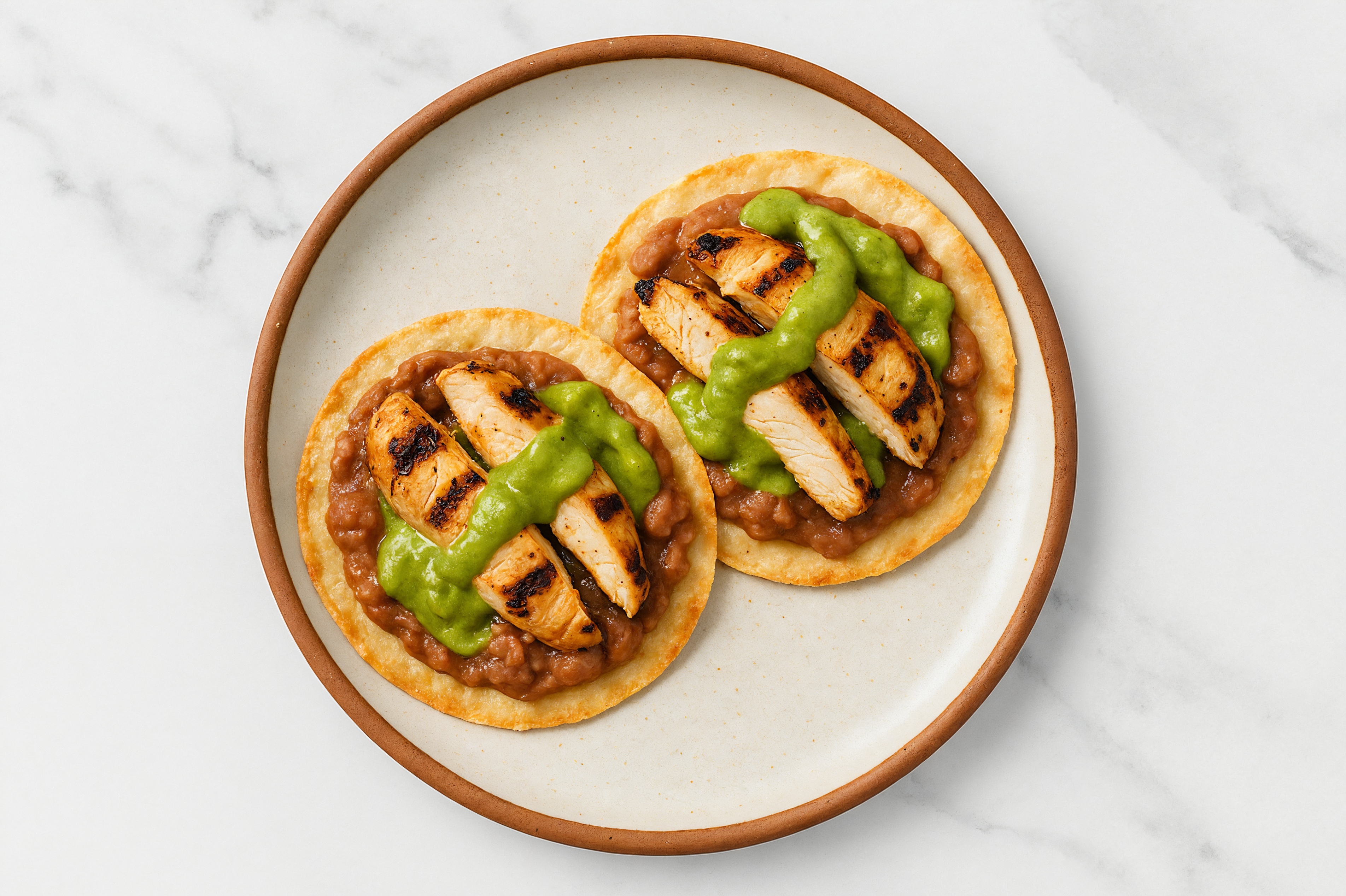 Extra Guac Blackened Chicken Tostada