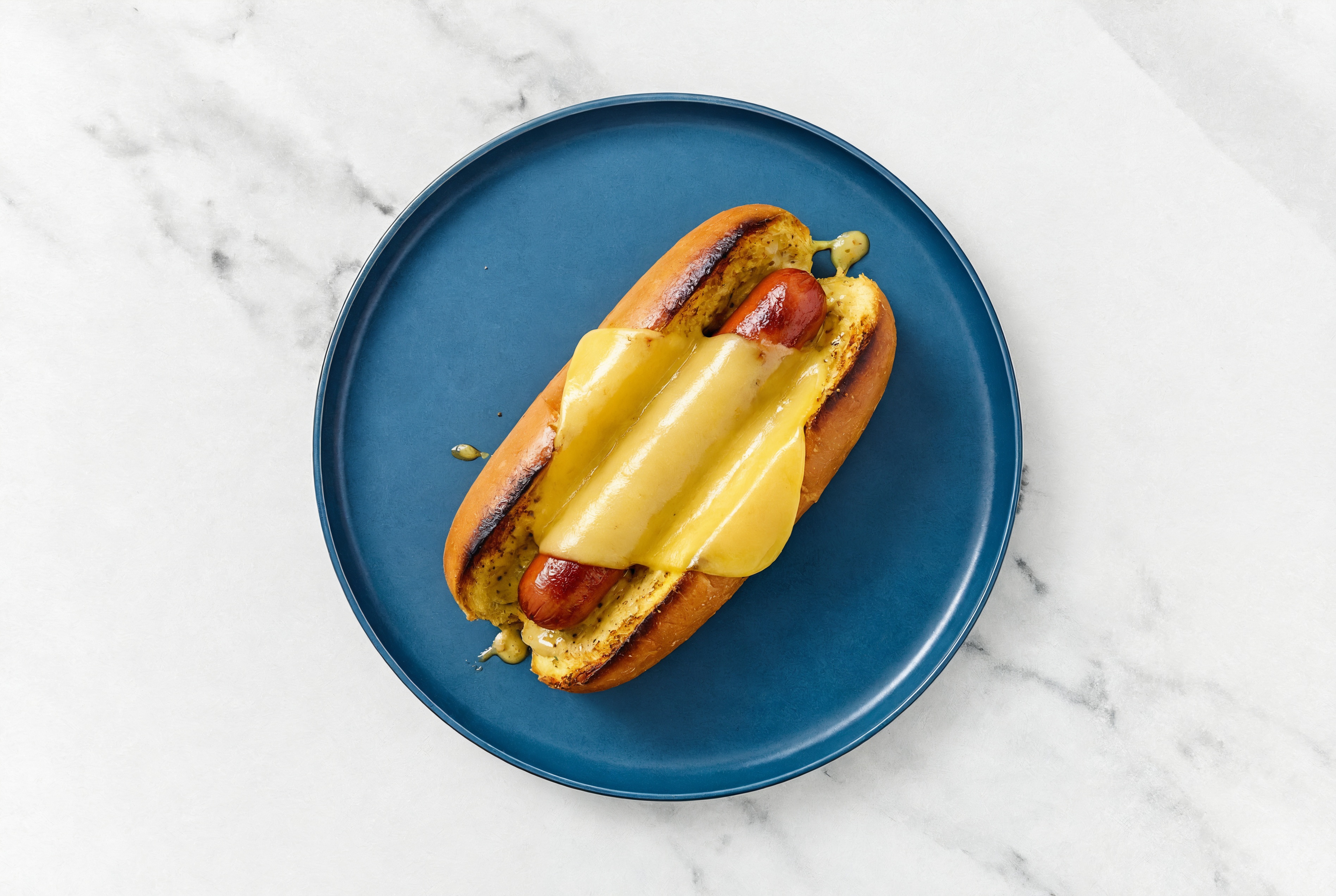 Vegan Cheddar Beef Hot Dog with Honey Mustard on Brioche