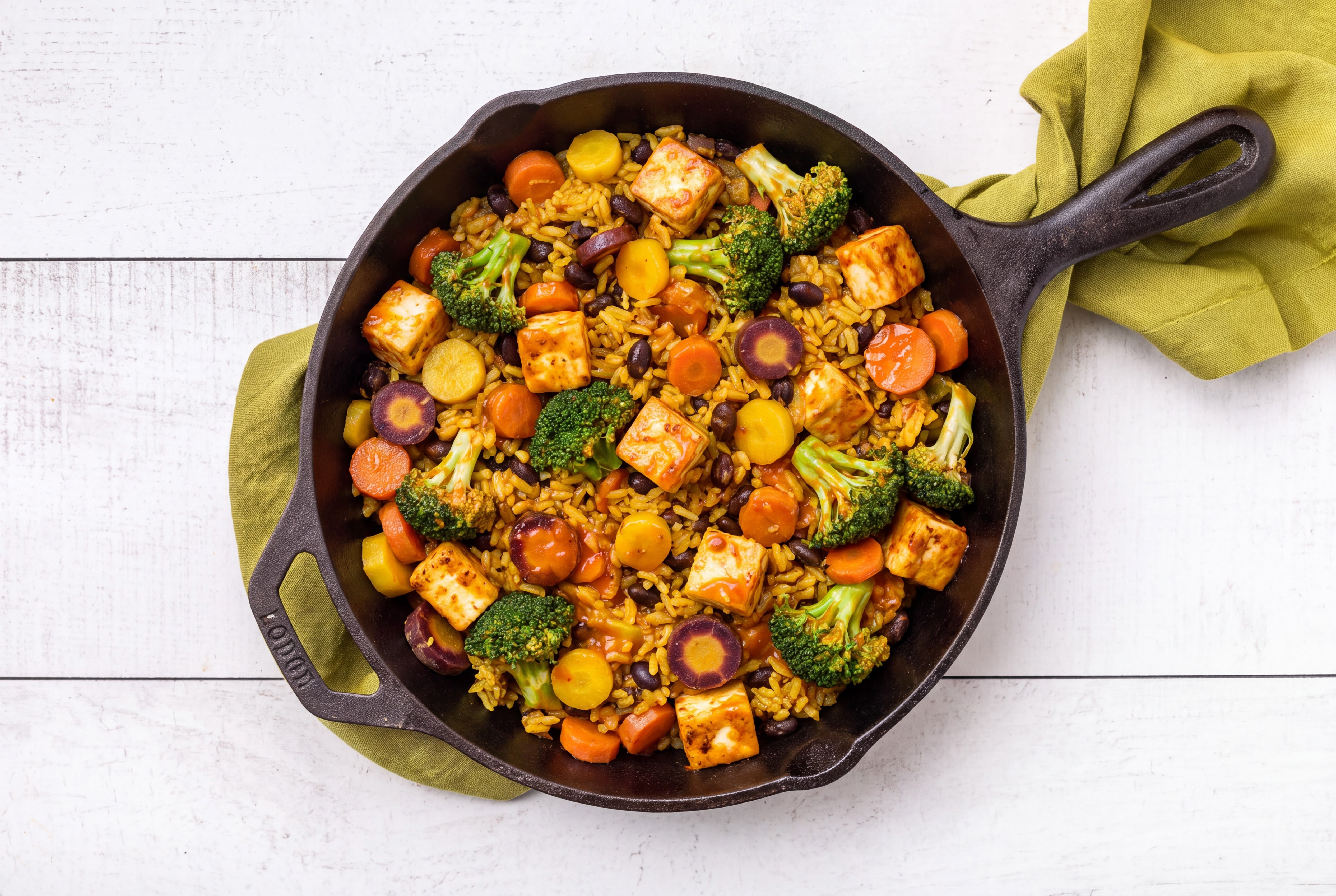 Herby Soft & Creamy Paneer in Peppery Sauce with Organic Broccoli + Carrots over Rice with Beans