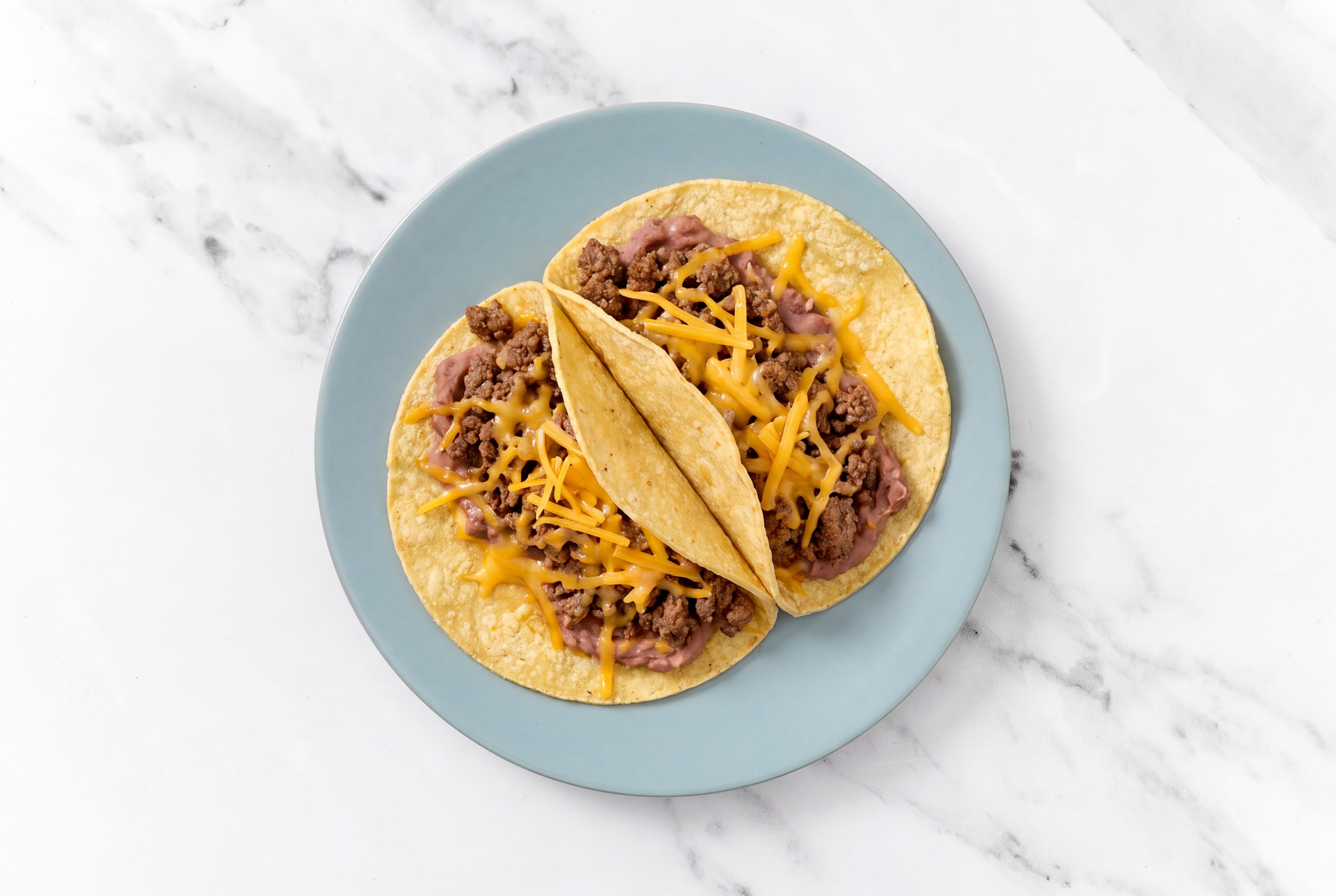 Herby Ground 93/7 Lean Beef Tacos with Cheddar Cheese & Refried Red Beans