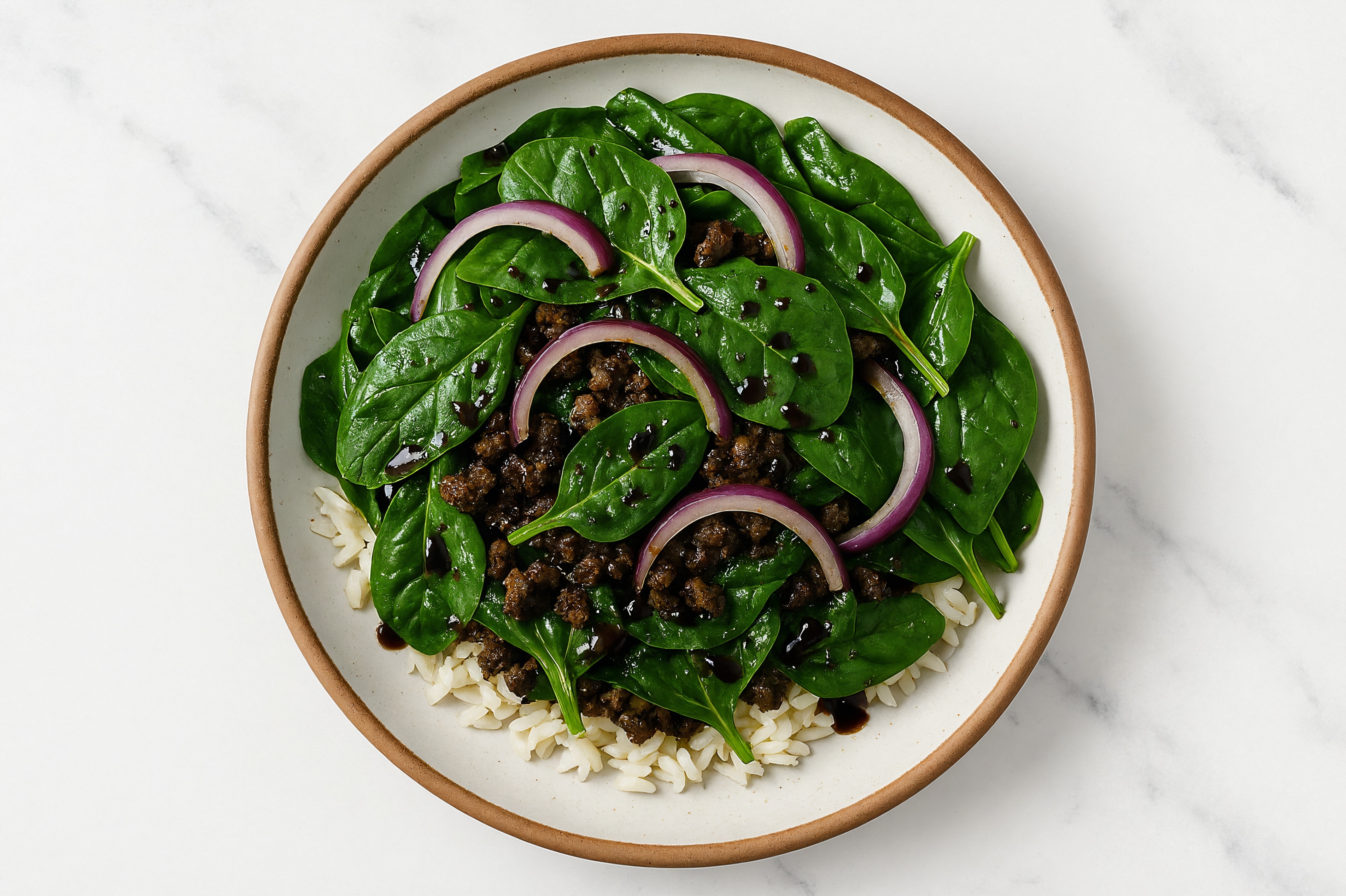  Ground Beef Patties, Pepper + Garlic Seasoning, Baby Spinach, Red Onion, Rice, Balsamic Vinegar